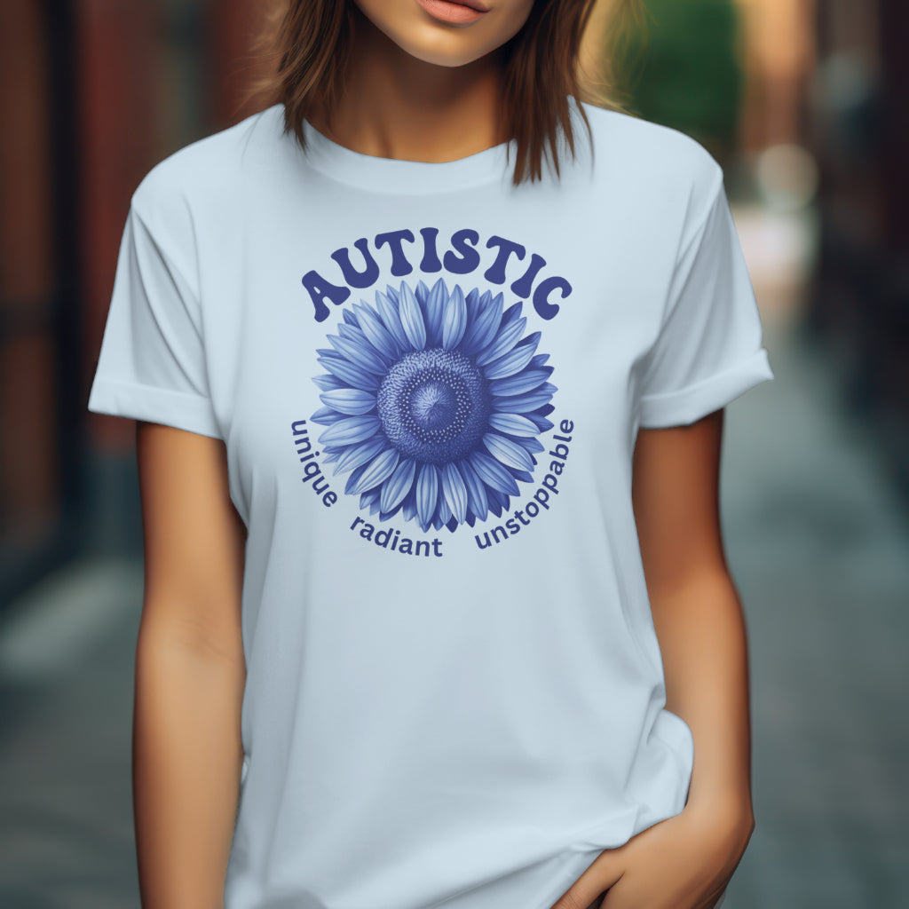 Autistic Unique Radiant Unstoppable digital design on a woman’s light blue t-shirt