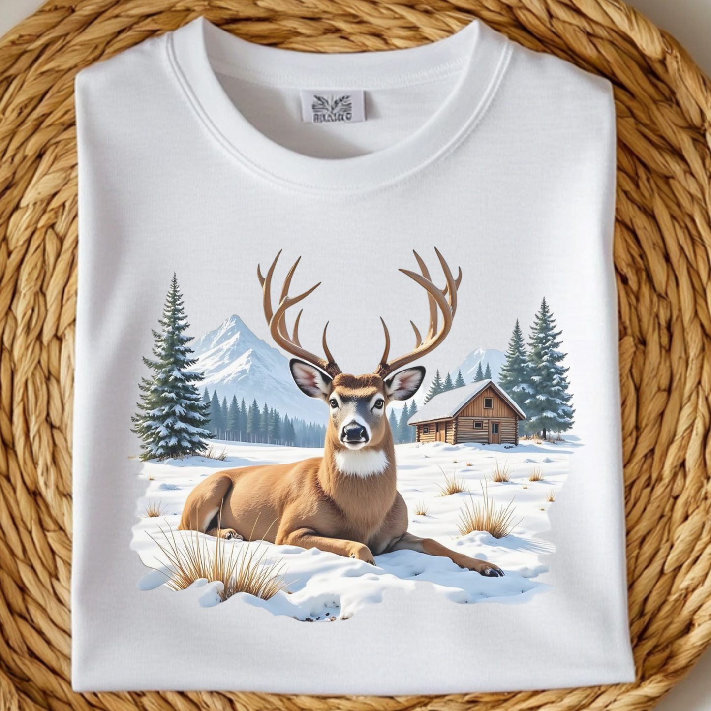 Deer On The Snow PNG digital design on a folded white t-shirt