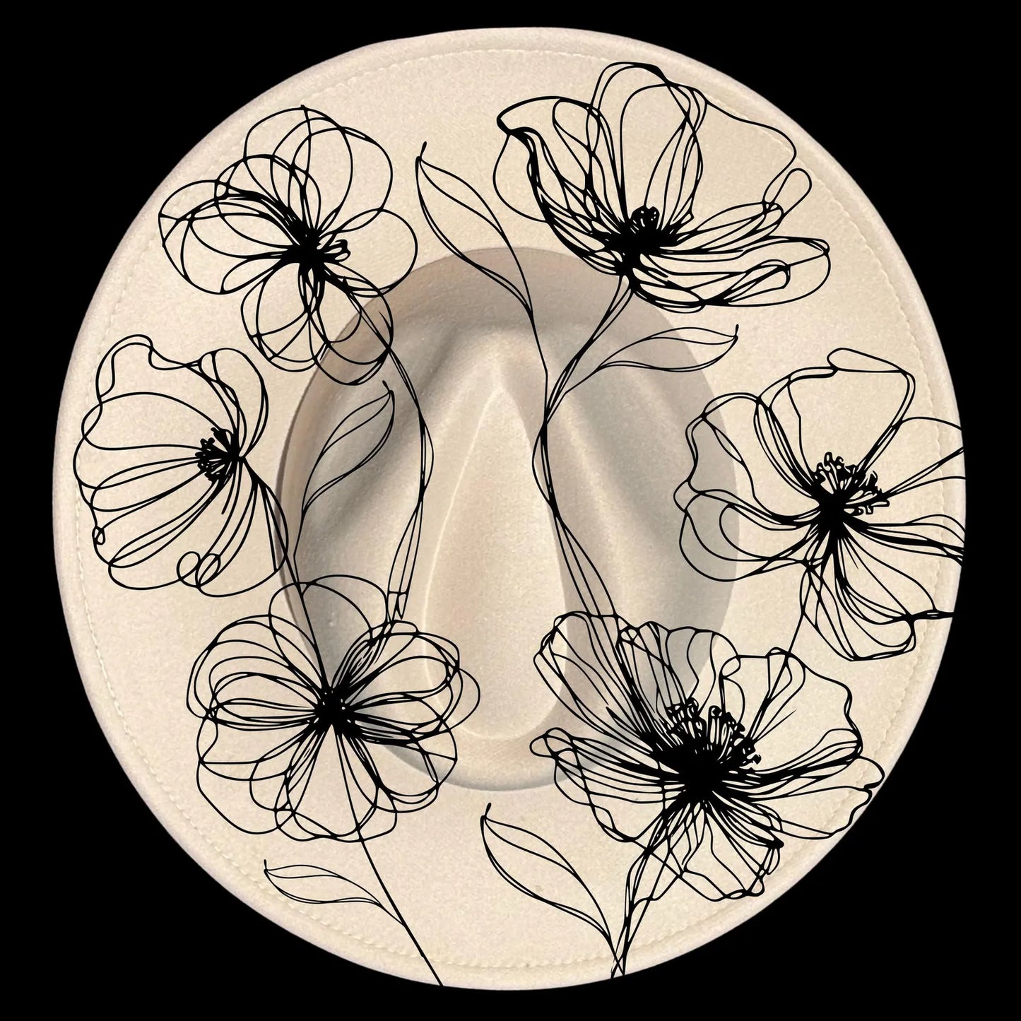 Decorative hat burning design with black poppies designs on a beige wide brim hat