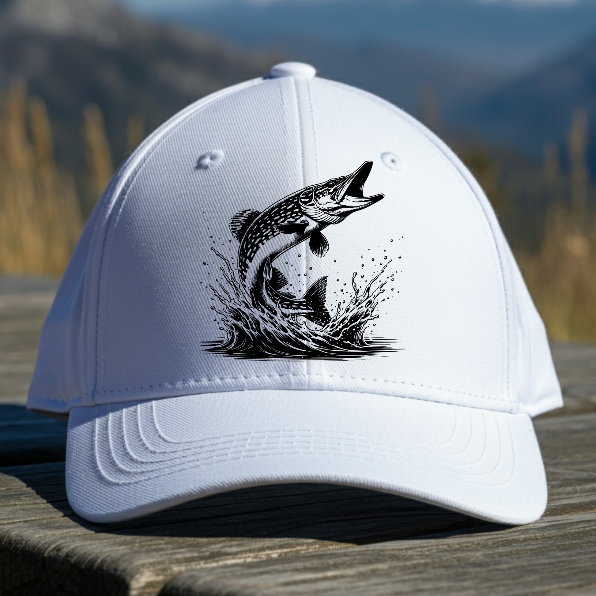 White cap with pike fish illustration on a wooden surface with a mountain background