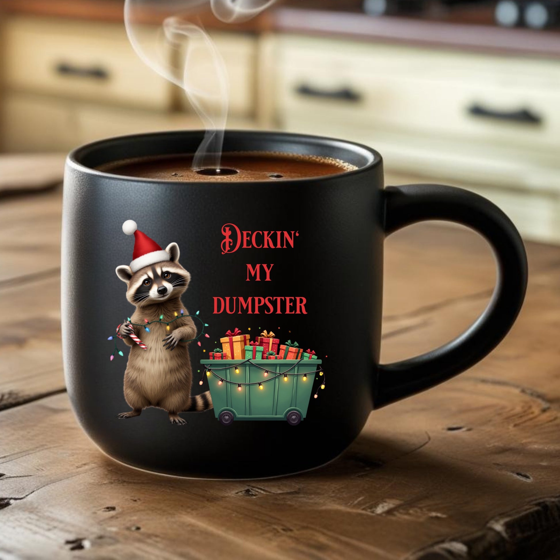 Black mug with a raccoon design and 'Deckin' My Dumpster' text on a wooden surface.