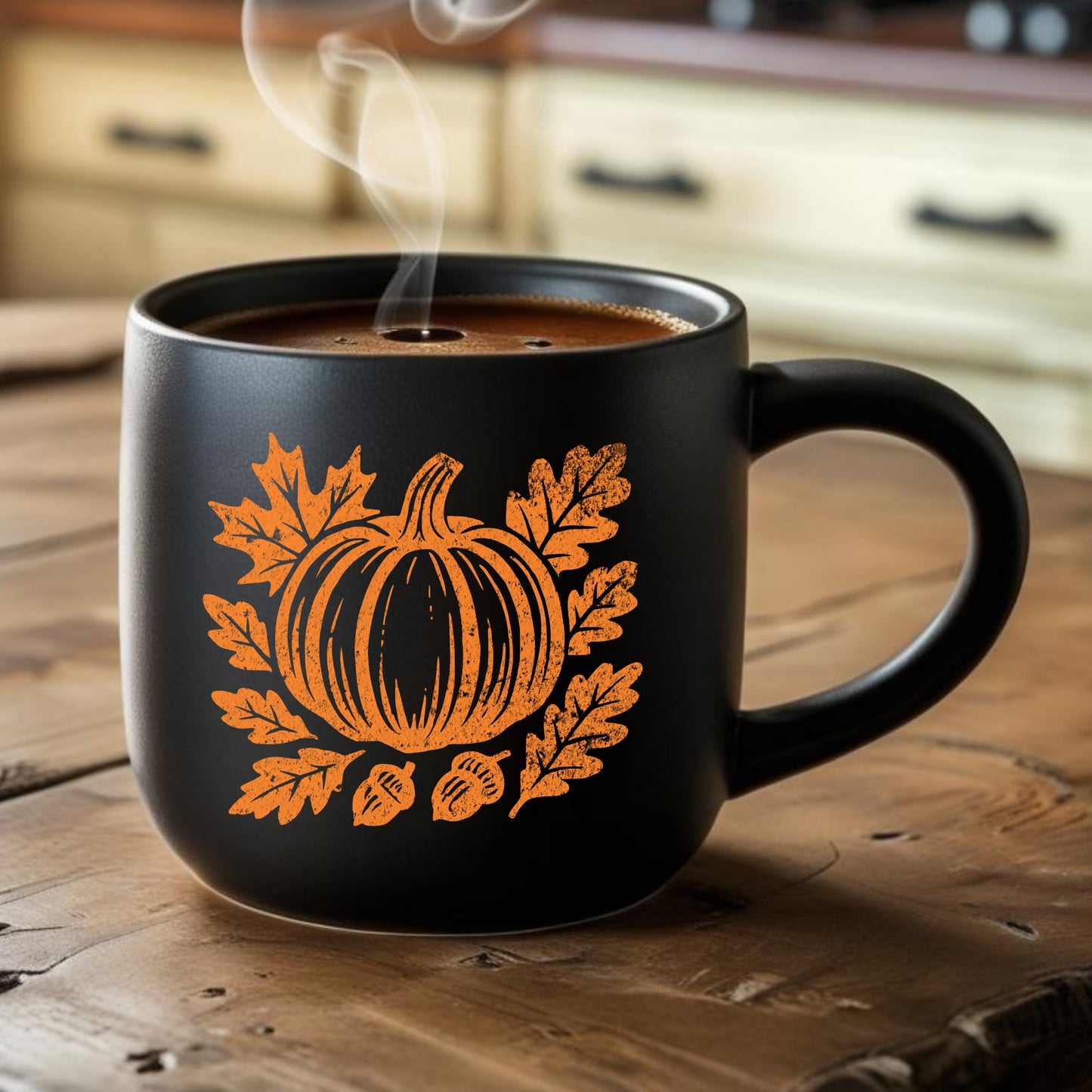 Black mug with pumpkin design on a wooden surface