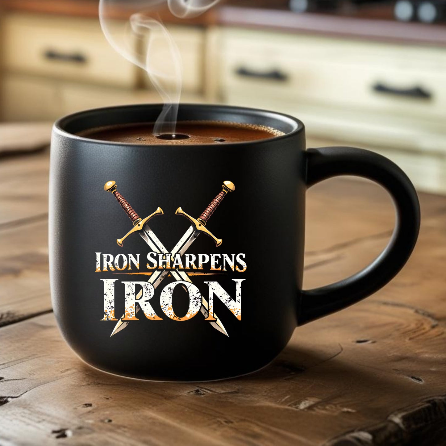 Black mug with 'Iron Sharpens Iron' text and crossed swords on a wooden surface with coffee.