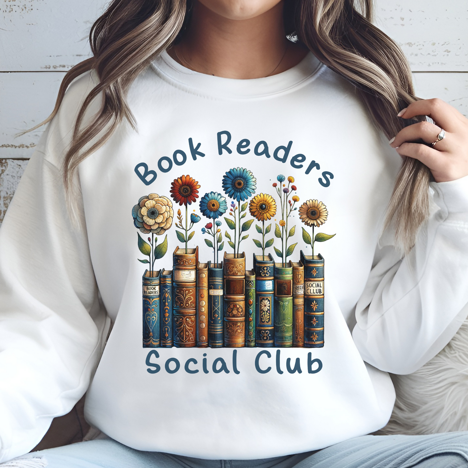 Book Readers Social Club PNG digital design on a woman's white sweatshirt