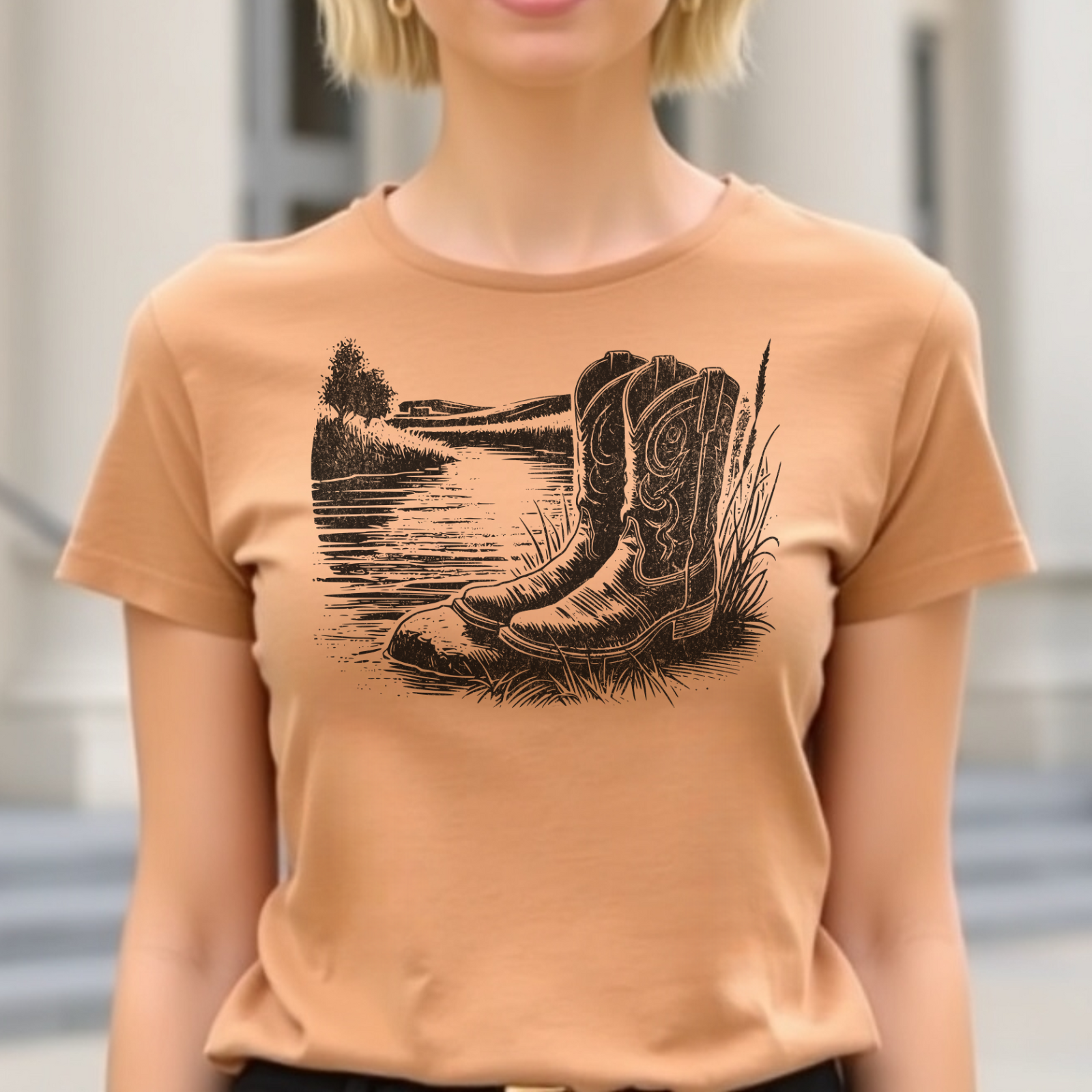 Boots By A River digital design on a peach t-shirt