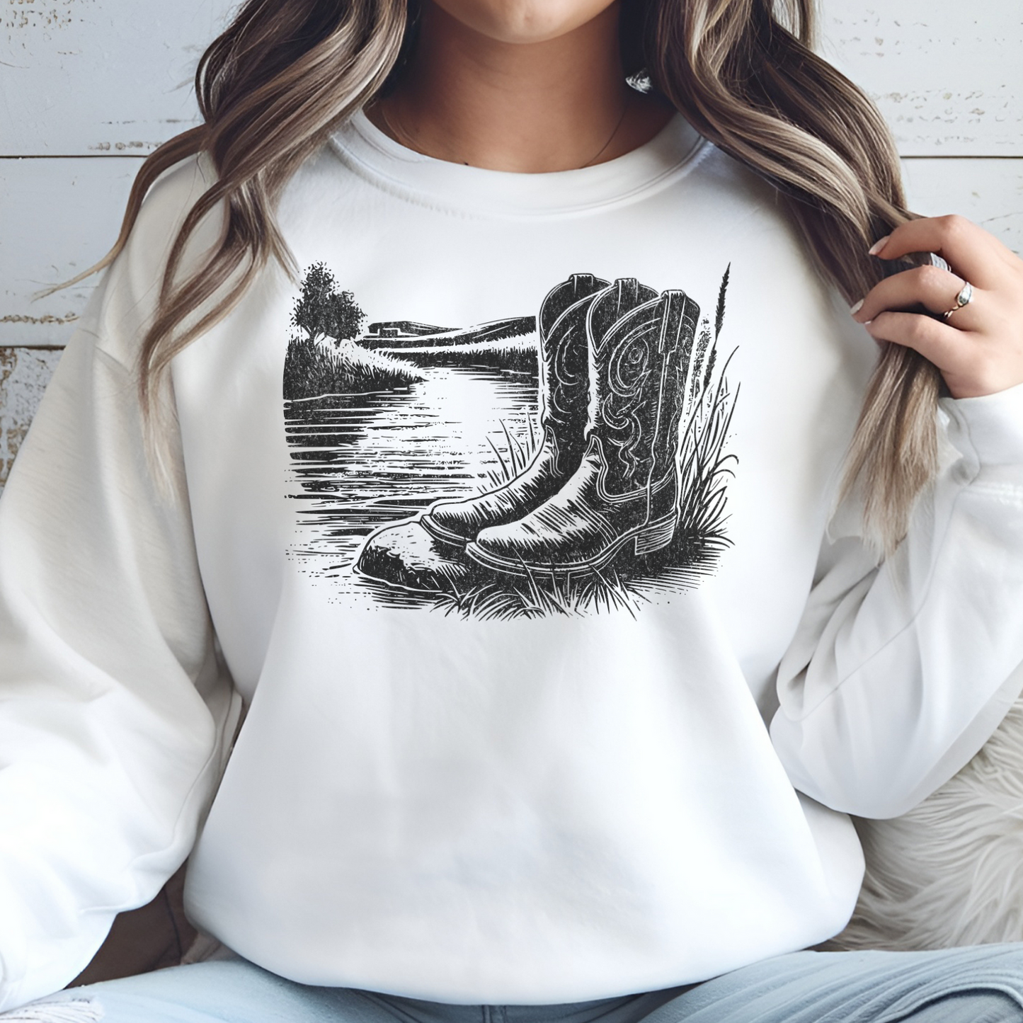 Boots By A River digital design on a white sweatshirt