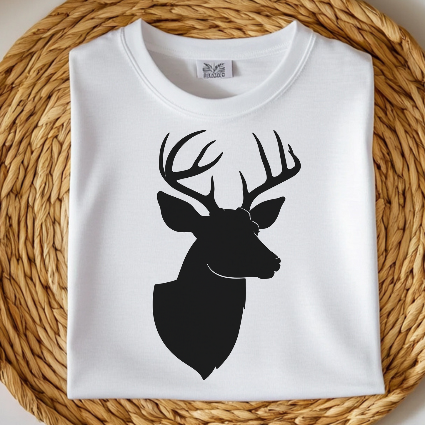 Buck Deer Head With Horns Silhouette digital download on a folded white t-shirt