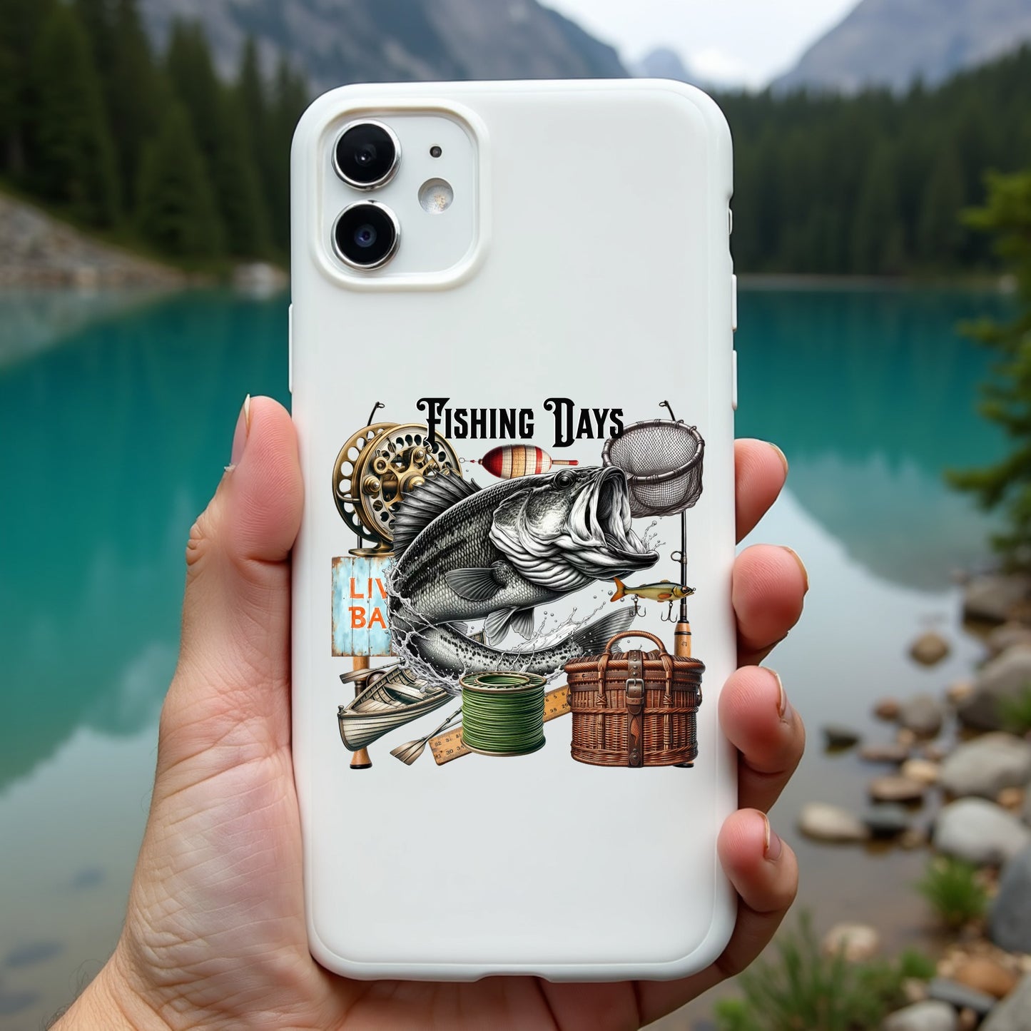 Phone case with fishing-themed design held in front of a scenic lake.