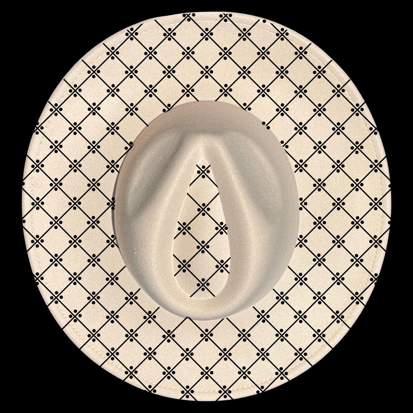 Wide brim hat with a black geometric pattern