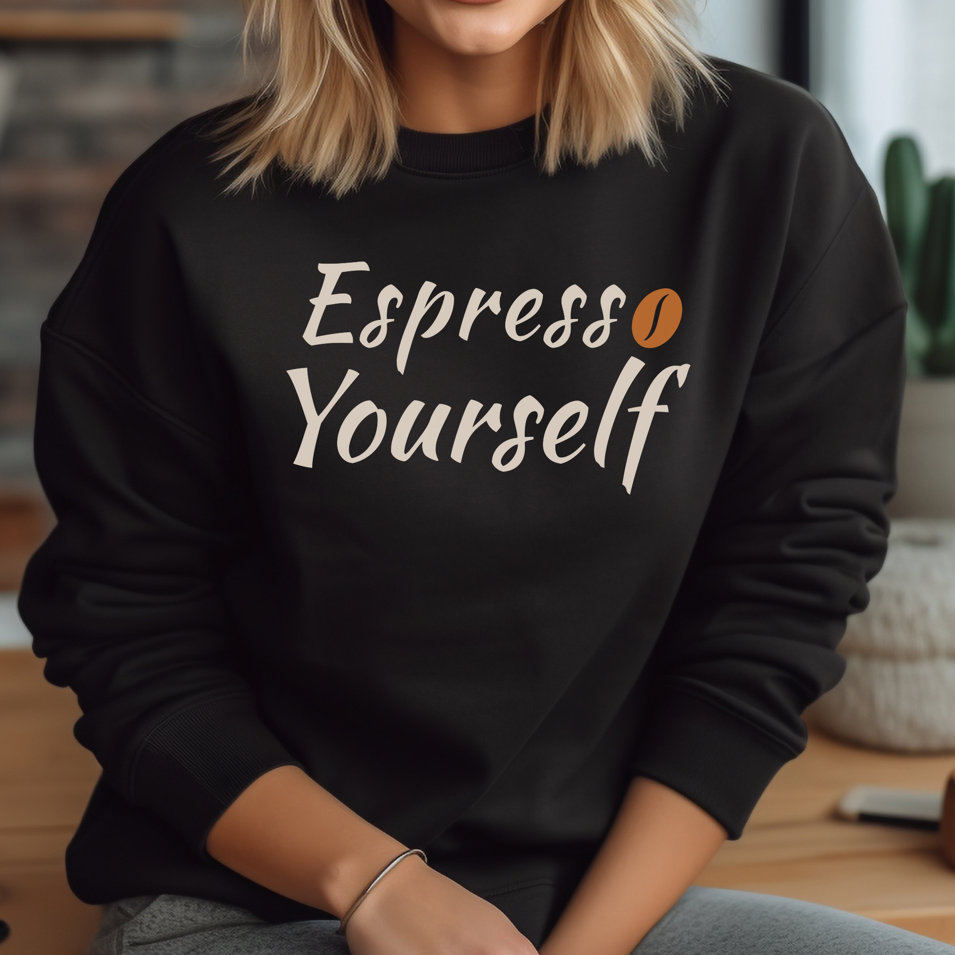Espresso Yourself PNG digital design with a coffee bean on a woman's black sweatshirt