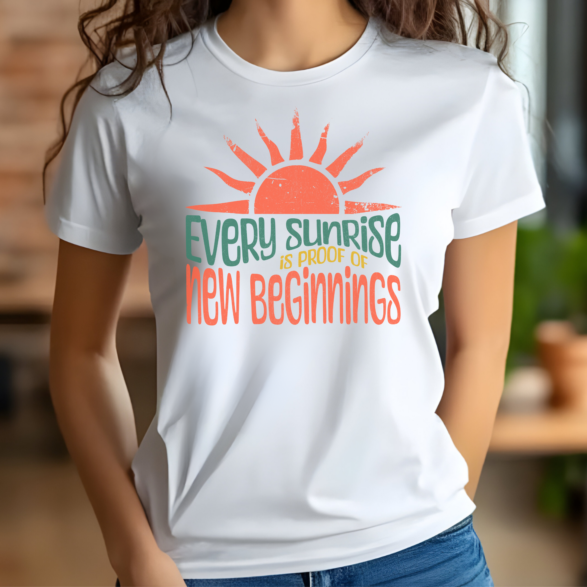 Every Sunrise Is Proof Of New Beginnings digital design on a woman’s white t-shirt