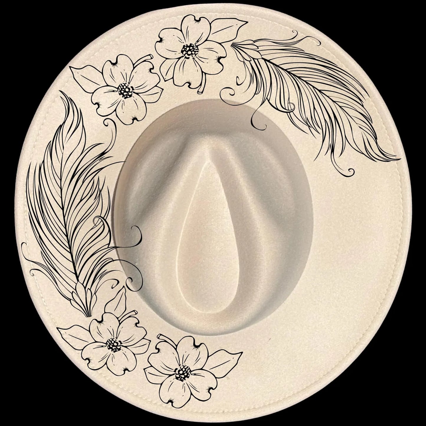 Feathers And Dogwood burned hat burning design on a wide brim hat.