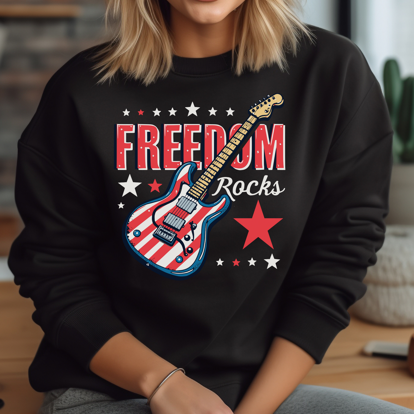 Freedom Rocks Guitar patriotic 4th of July digital design on a woman's black sweatshirt