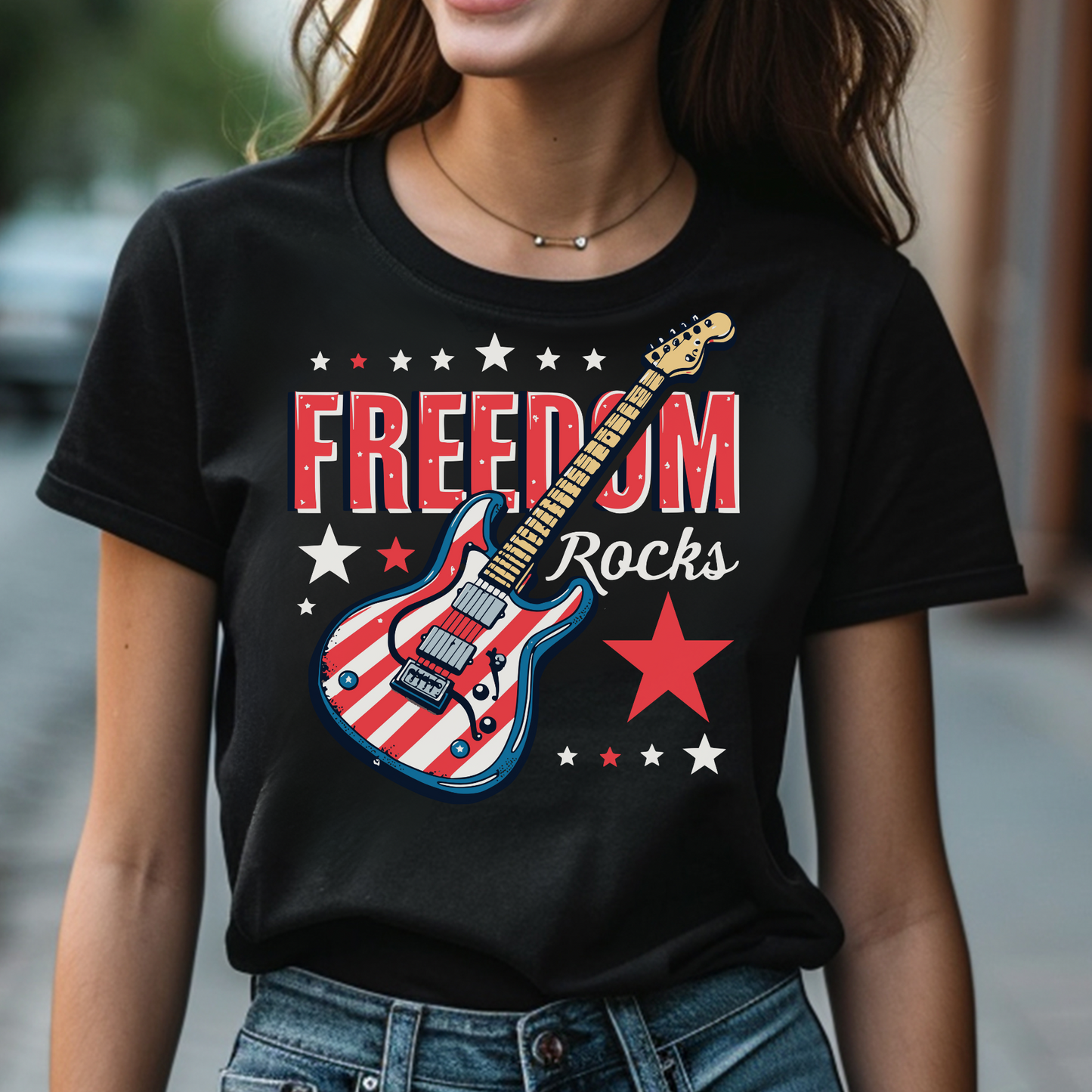 Freedom Rocks Guitar patriotic 4th of July digital design on a woman's black t-shirt