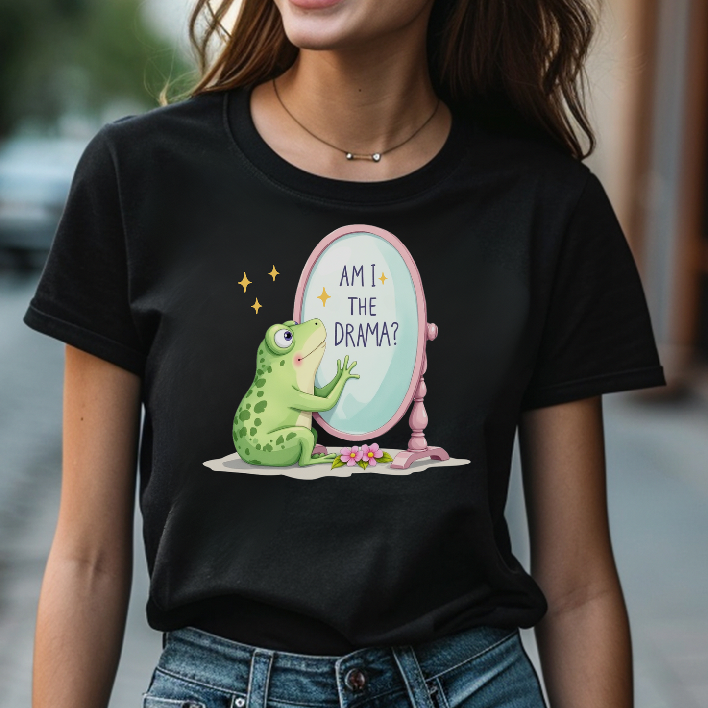 Am I The Drama? digital design on a woman’s black t-shirt