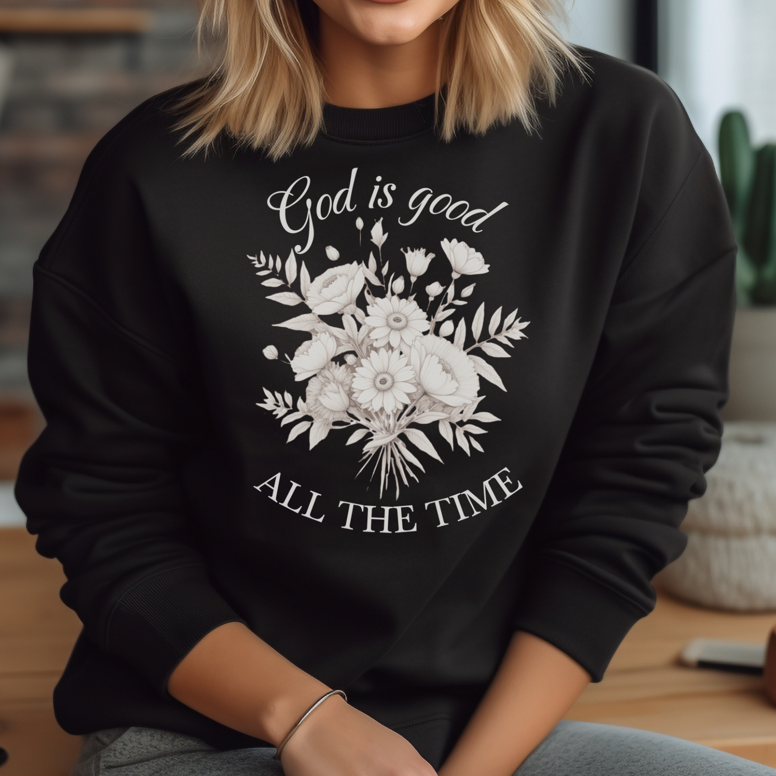 God Is Good All The Time digital design on a woman’s black sweatshirt