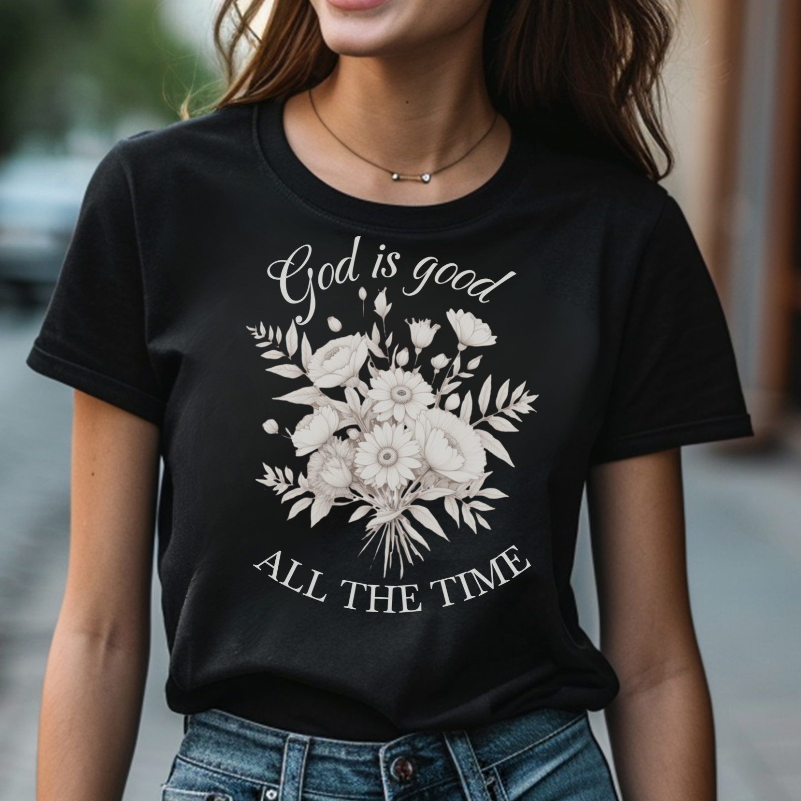God Is Good All The Time digital design on a woman’s black t-shirt
