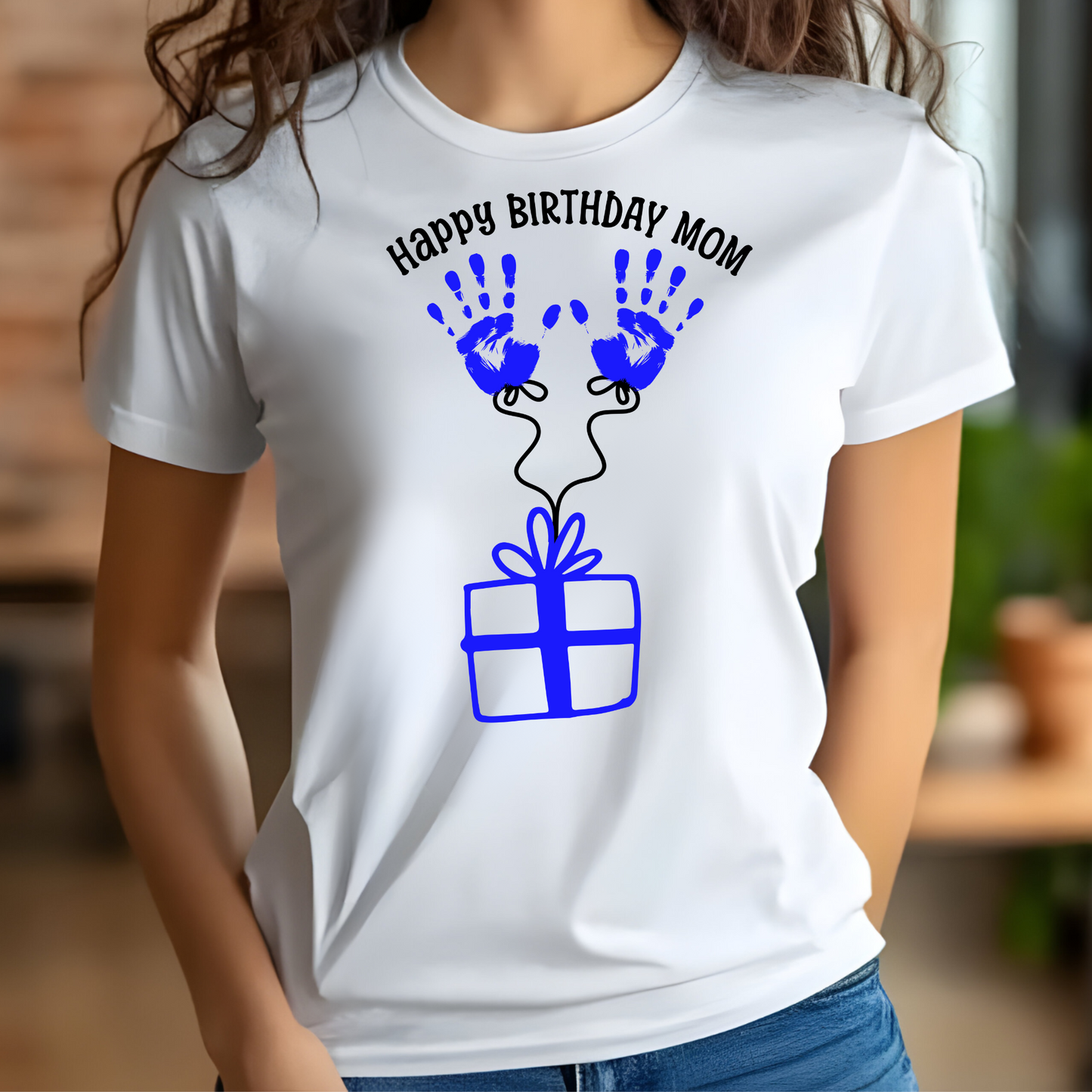 Happy Birthday Mom Blue Handprints digital design on a woman’s t-shirt