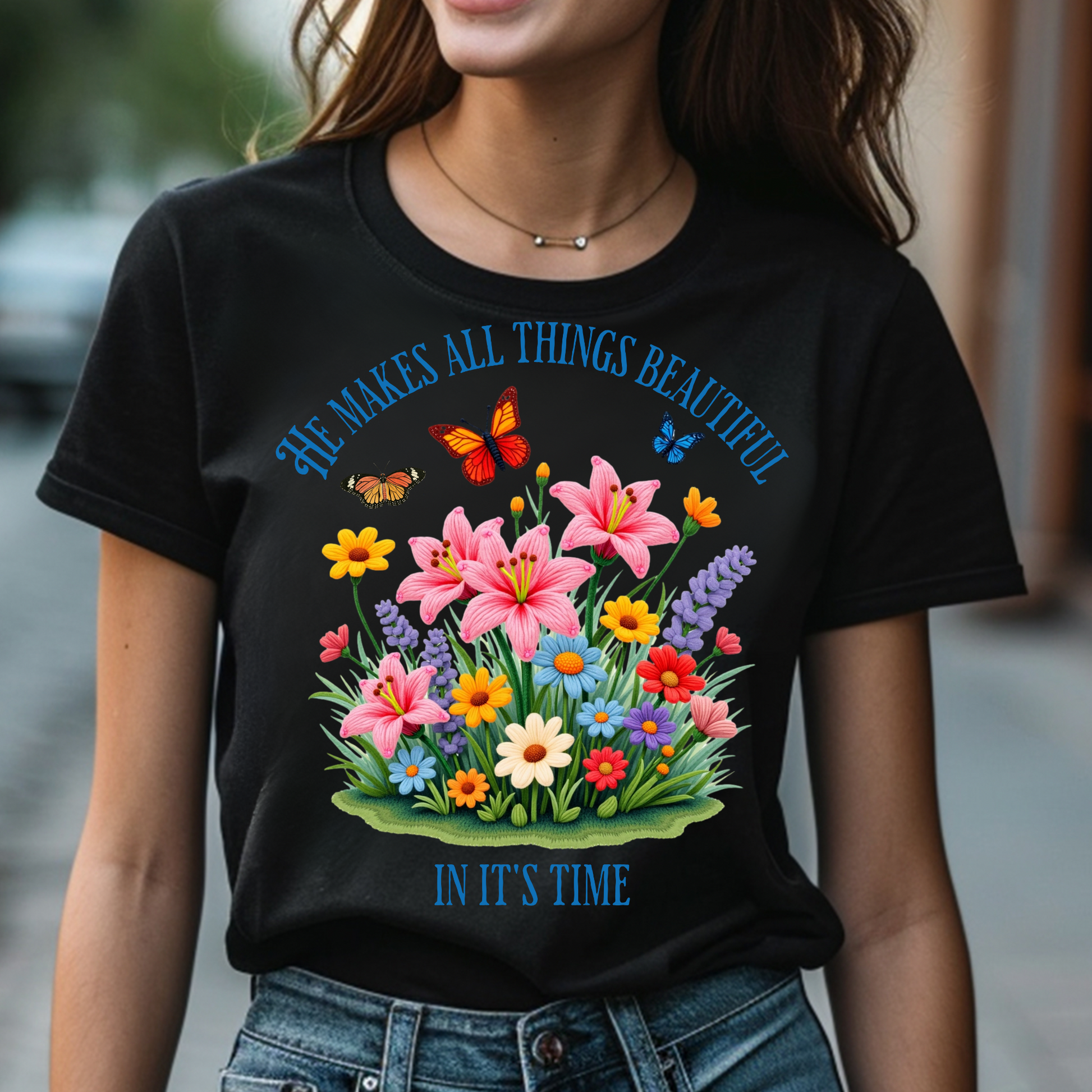 He Makes All Things Beautiful In It's Time floral design on a woman's black t-shirt