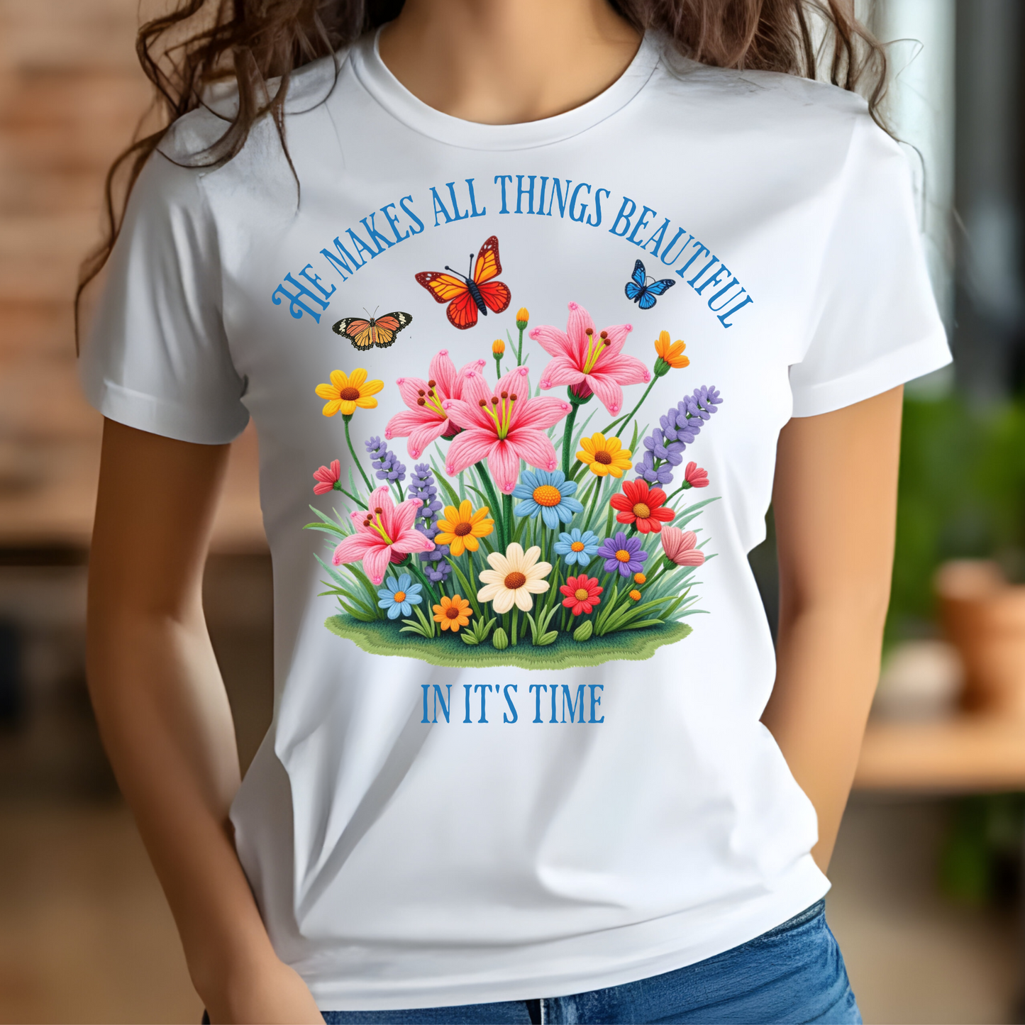 He Makes All Things Beautiful In It's Time floral design on a woman's white t-shirt
