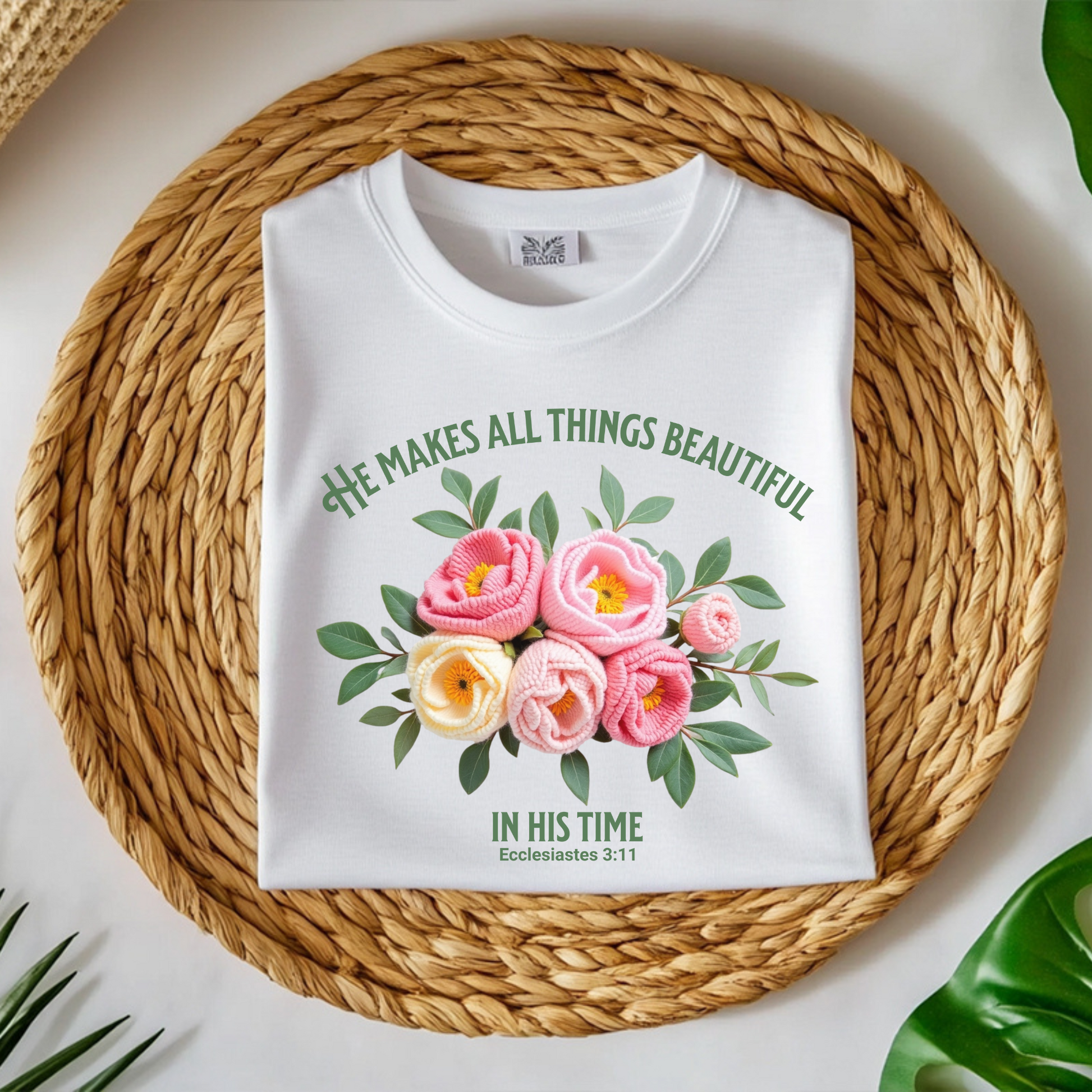 He Makes All Things Beautiful In His Time Ecclesiastes 3:11 digital design on a folded white t-shirt
