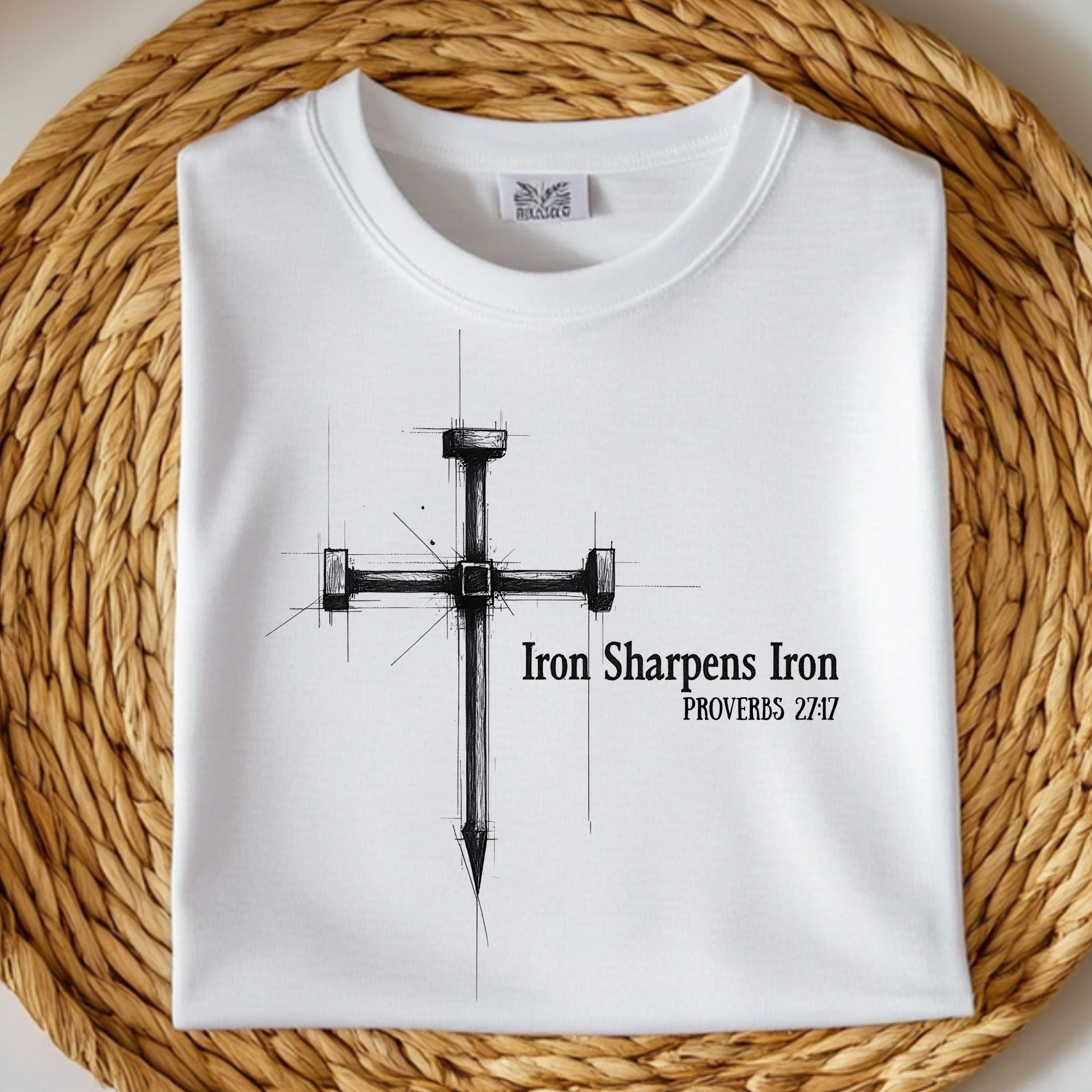 Iron Sharpens Iron digital design on a folded t-shirt