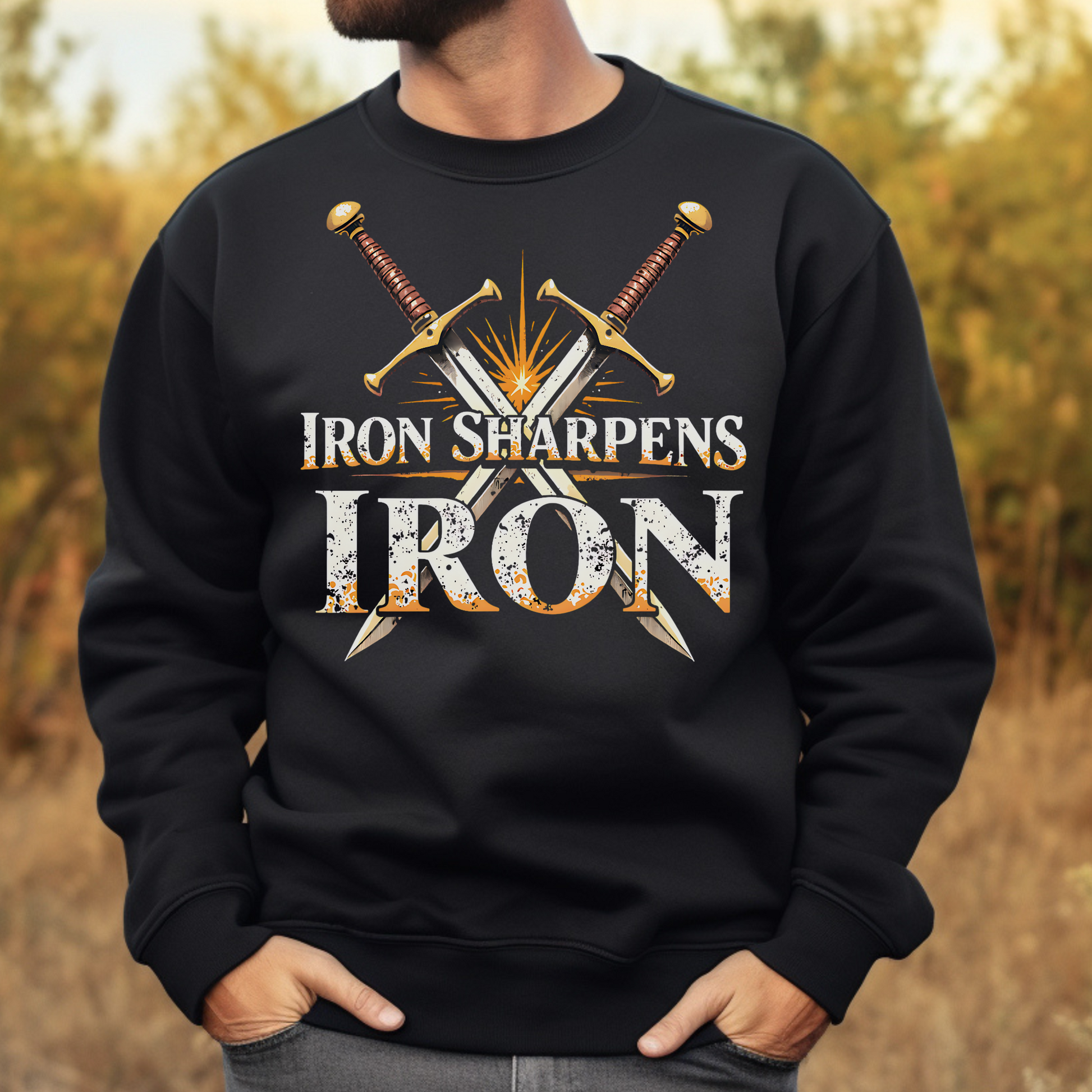 Iron Sharpens Iron Christian PNG digital design on a man's black sweatshirt
