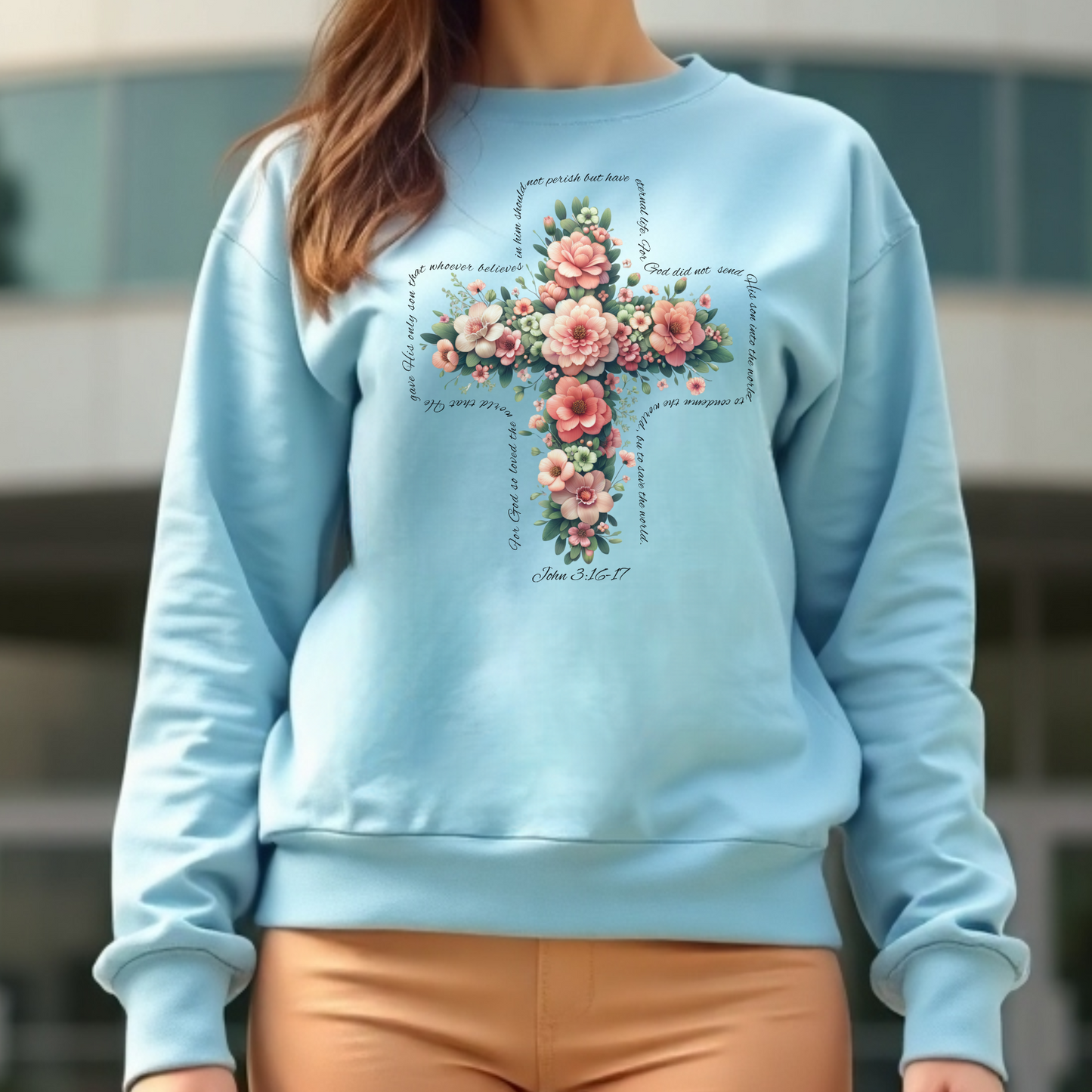 Christian Floral Cross with John 3:16 text on a woman's blue sweatshirt