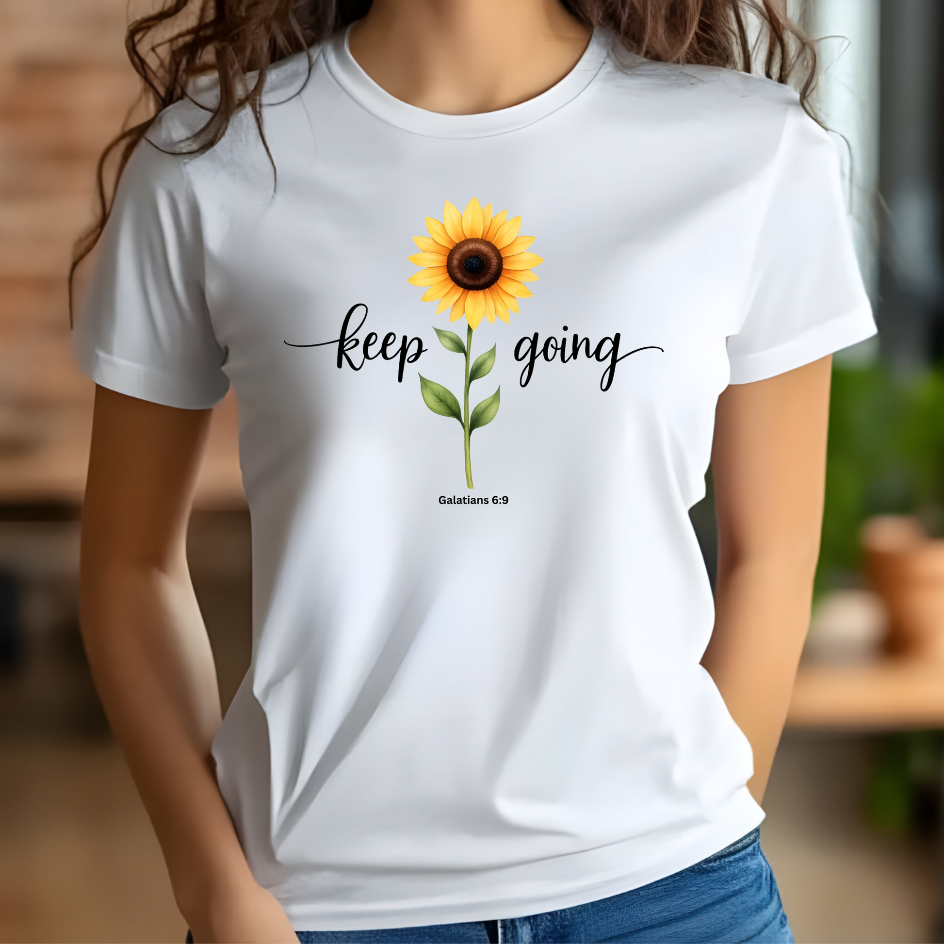 Keep Going Sunflower Galatians 6:9 digital design on a woman’s white t-shirt