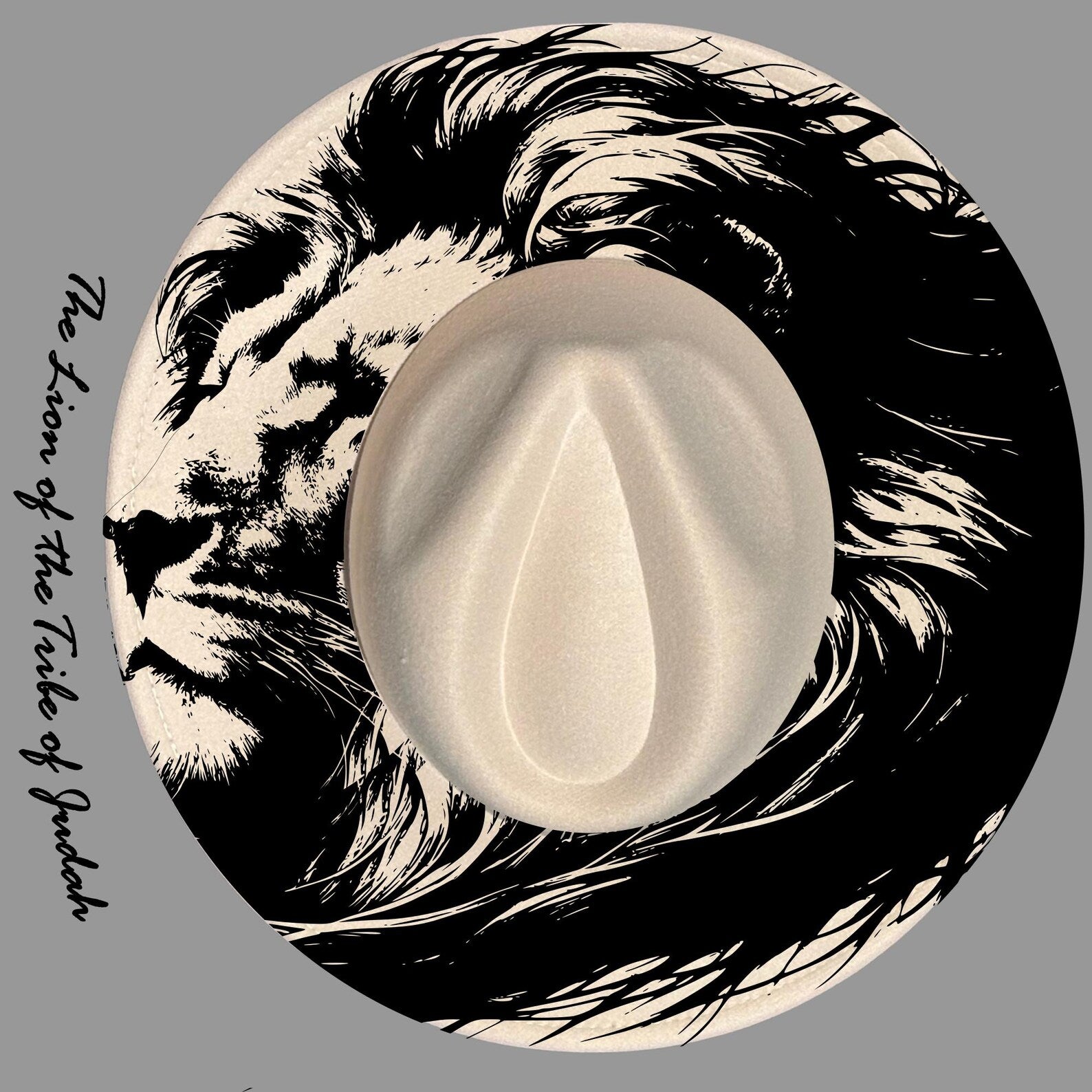 Hat burning design with lion illustration on a wide brim hat