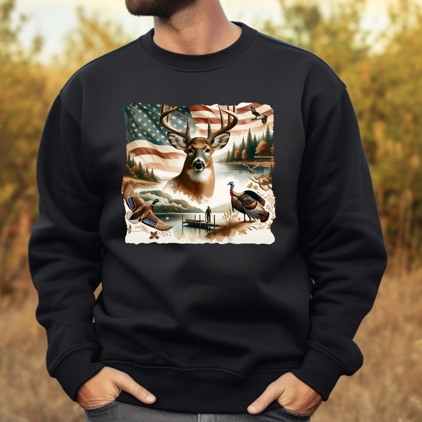 Black sweatshirt with a nature-themed graphic featuring a deer, American flag, and birds on a blurred natural background.