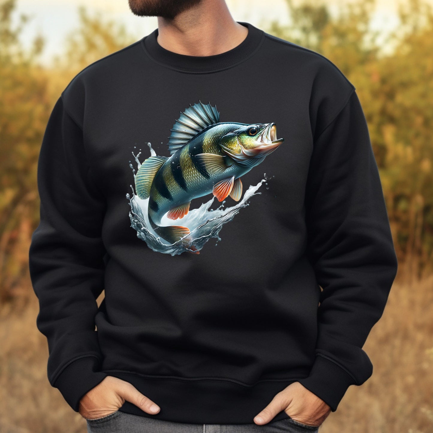Black sweatshirt with a colorful perch fish design worn by a man outdoors.