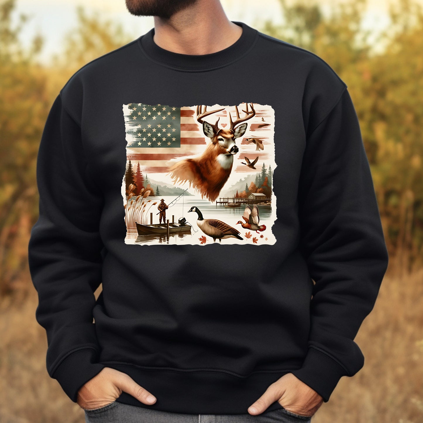 Black sweatshirt with a nature-themed graphic featuring a deer, American flag, and outdoor elements.