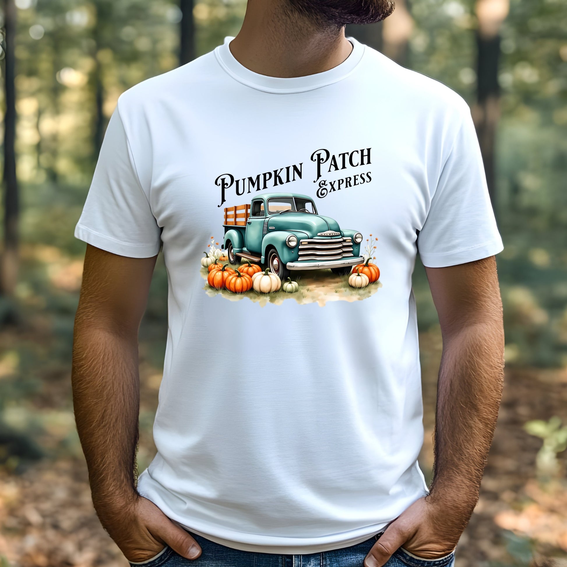 Man wearing a white t-shirt with a pumpkin patch truck graphic in an outdoor setting