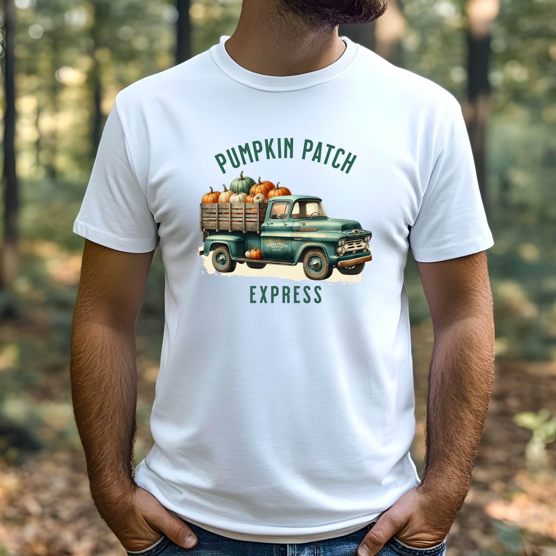 A man wearing a t-shirt with a pumpkin digital design in the woods