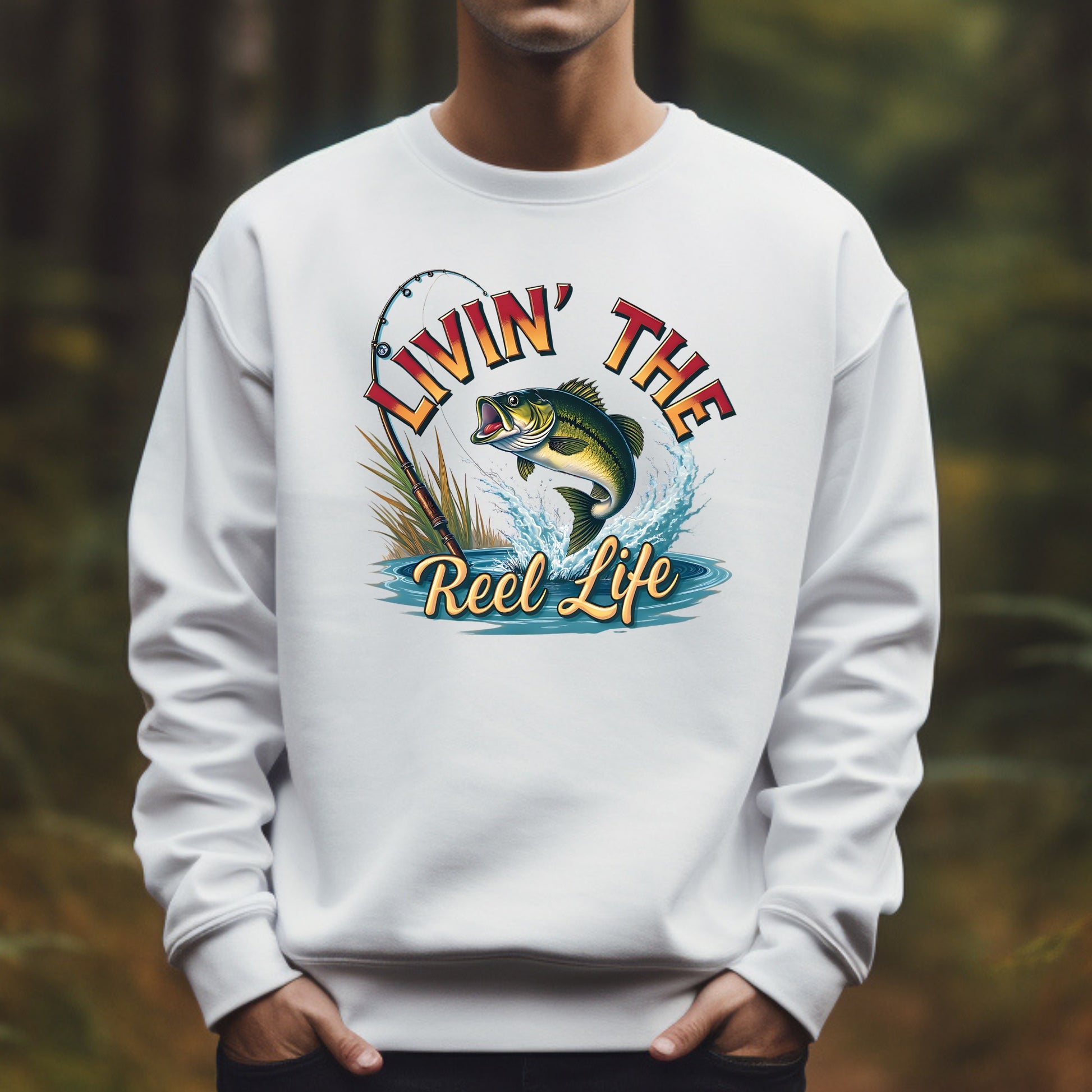 Man wearing a white sweatshirt with a fishing-themed graphic and text.