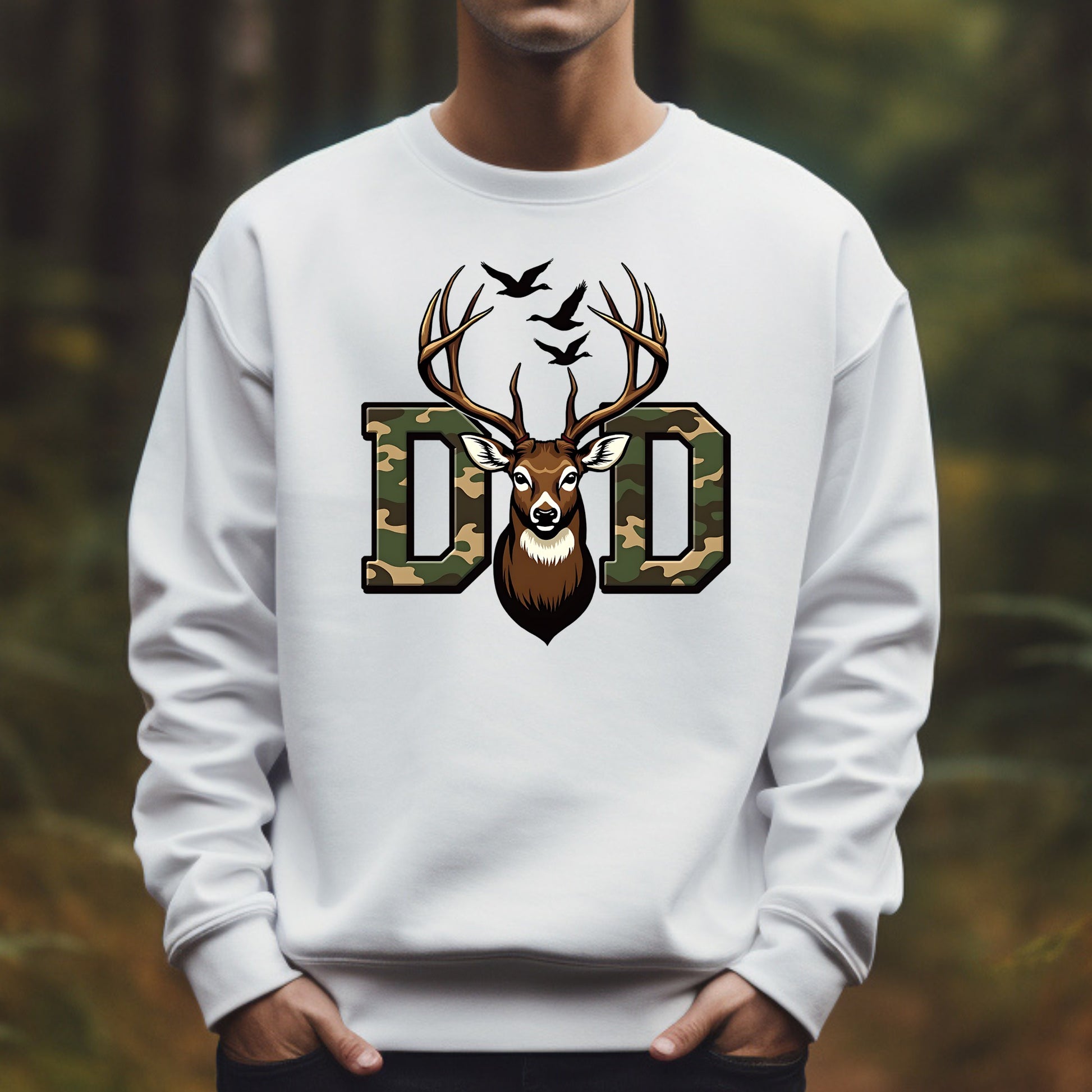 White sweatshirt with a deer design and 'DAD' text on a blurred forest background