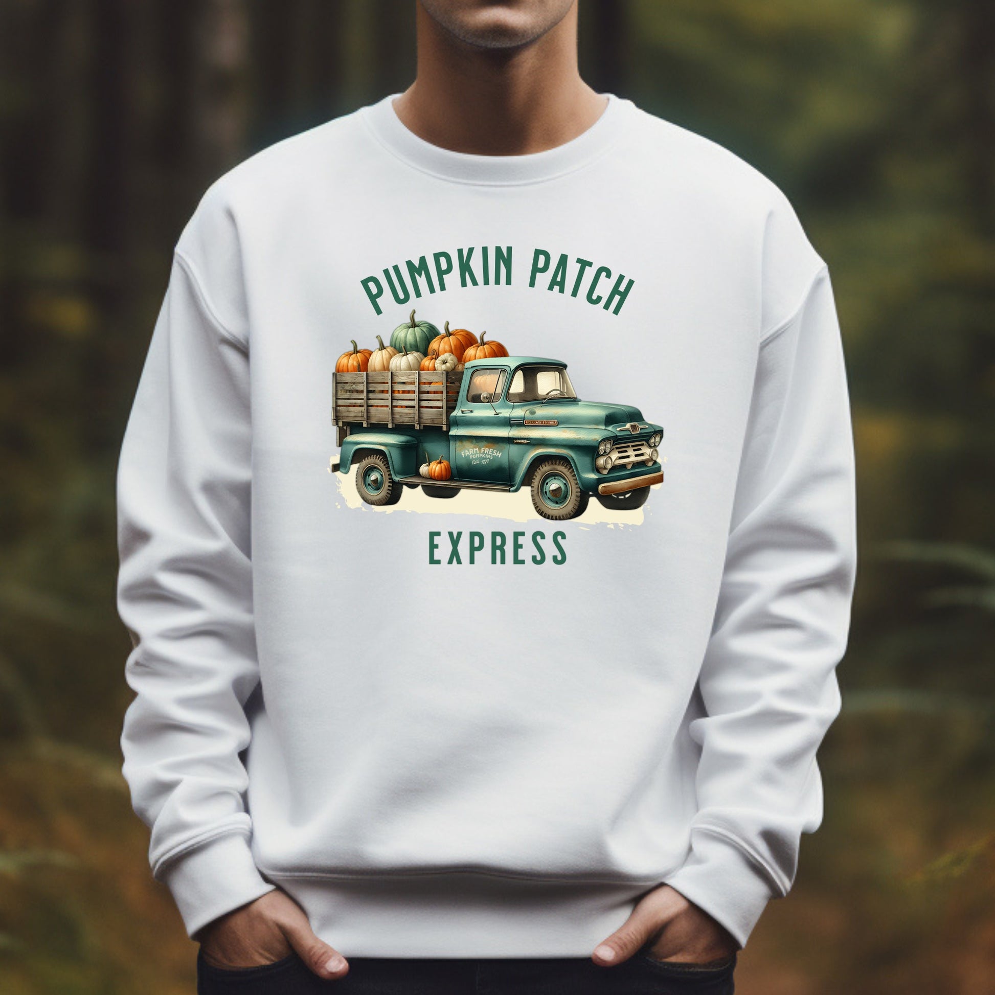 A man wearing a white t-shirt with a vintage pumpkin truck