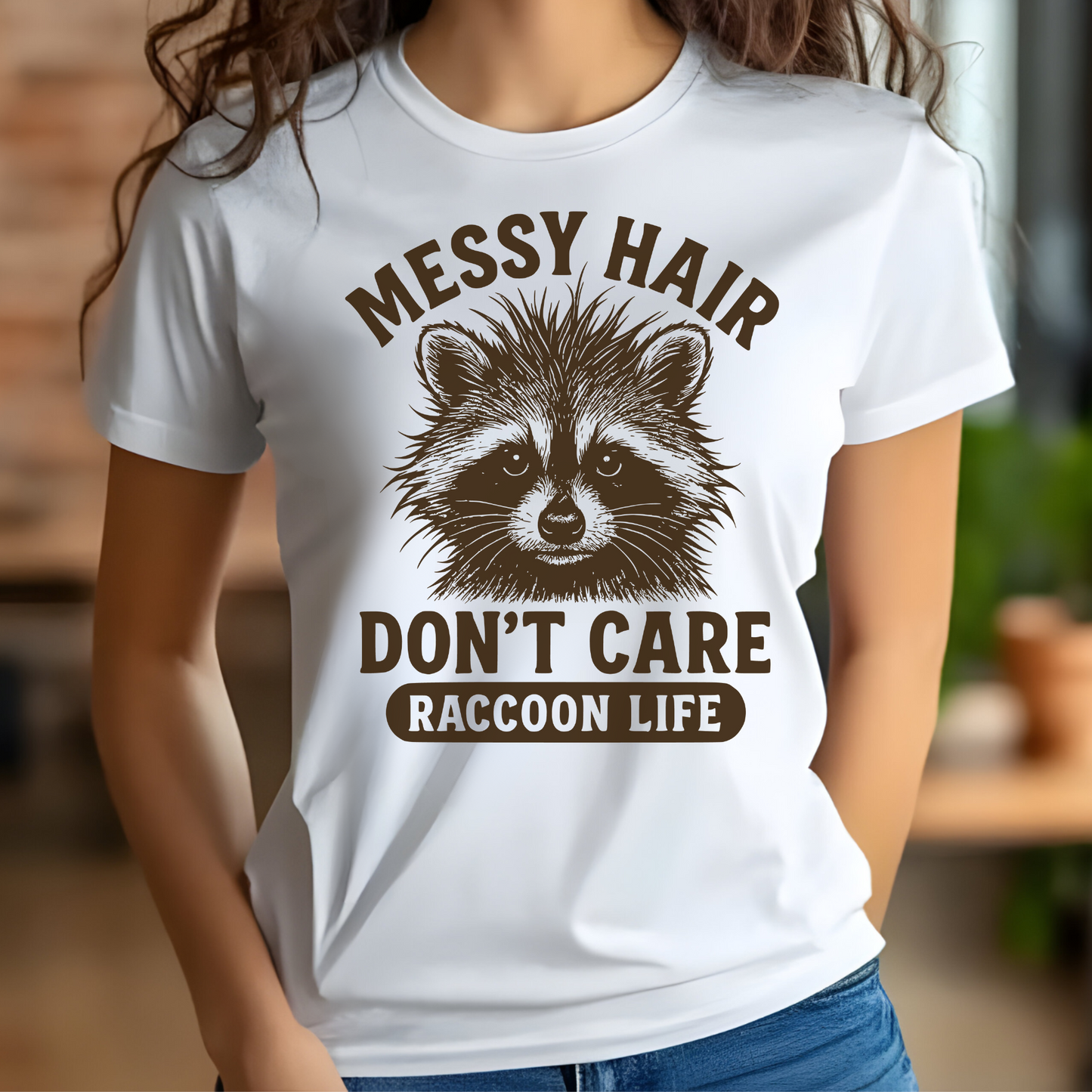 Messy Hair Don't Care Raccoon Life digital design on a woman's white t-shirt