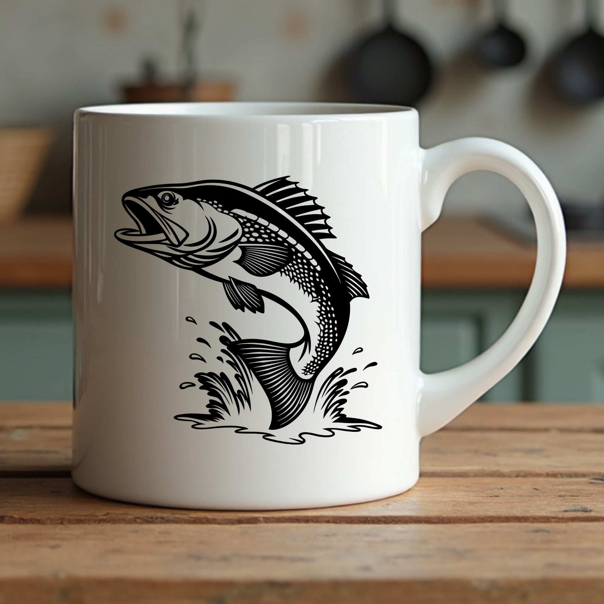 White mug with black walleye fish design on a wooden surface