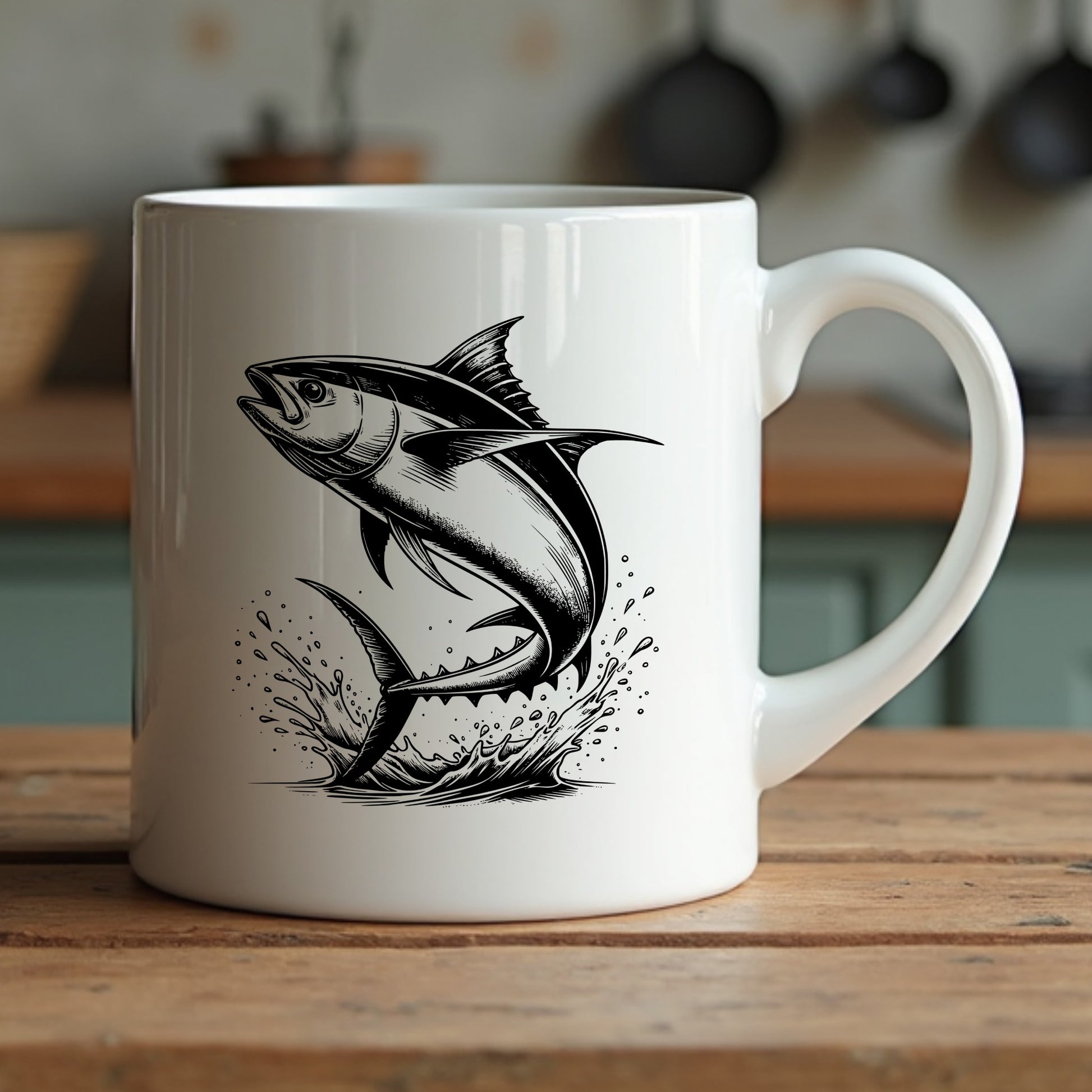 White mug with black tuna fish illustration on a wooden surface