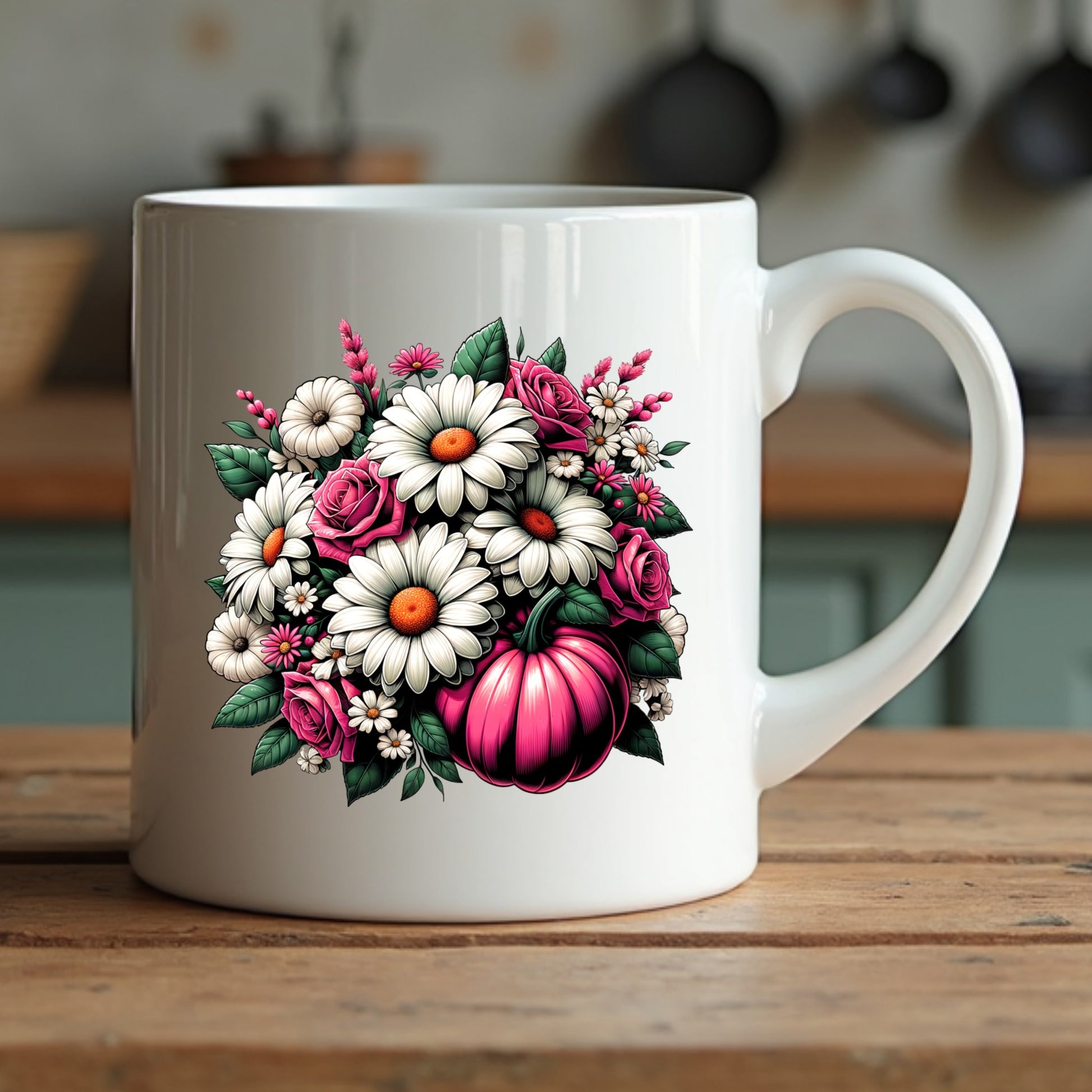 White mug with floral design featuring pink pumpkins and flowers on a wooden surface.