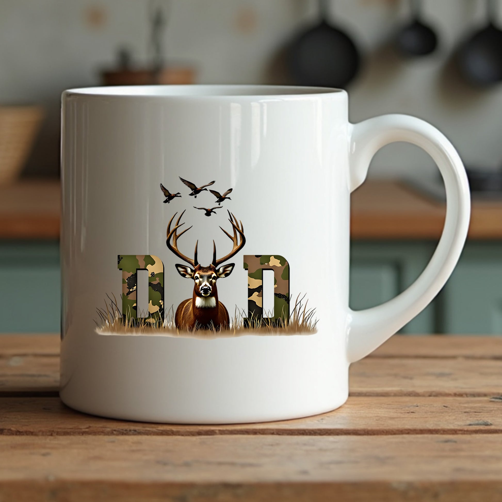 White mug with a deer design and 'Dad' text on a wooden surface.