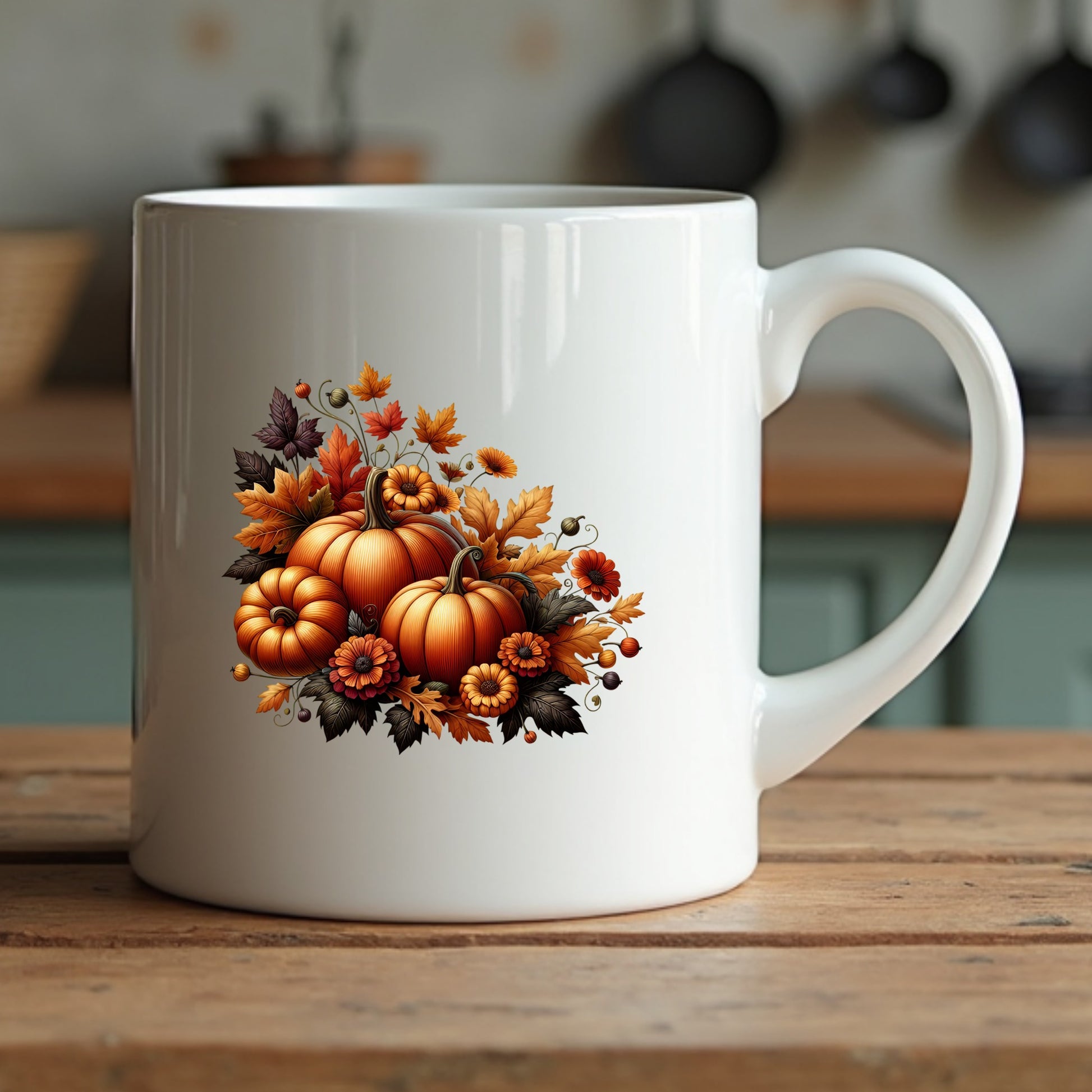 White mug with autumn-themed design featuring pumpkins and leaves on a wooden surface.