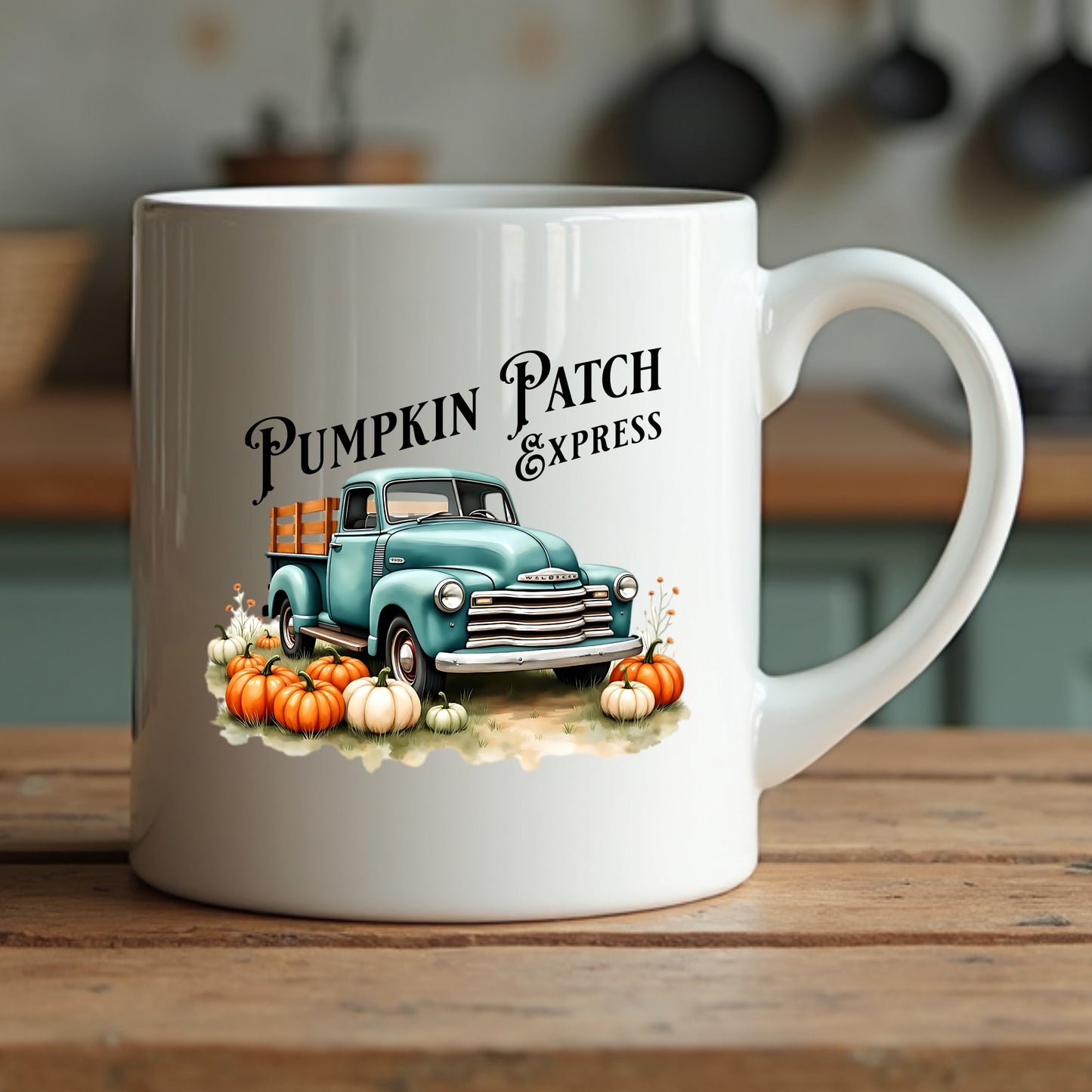 White mug with 'Pumpkin Patch Express' design featuring a vintage truck and pumpkins on a wooden surface.