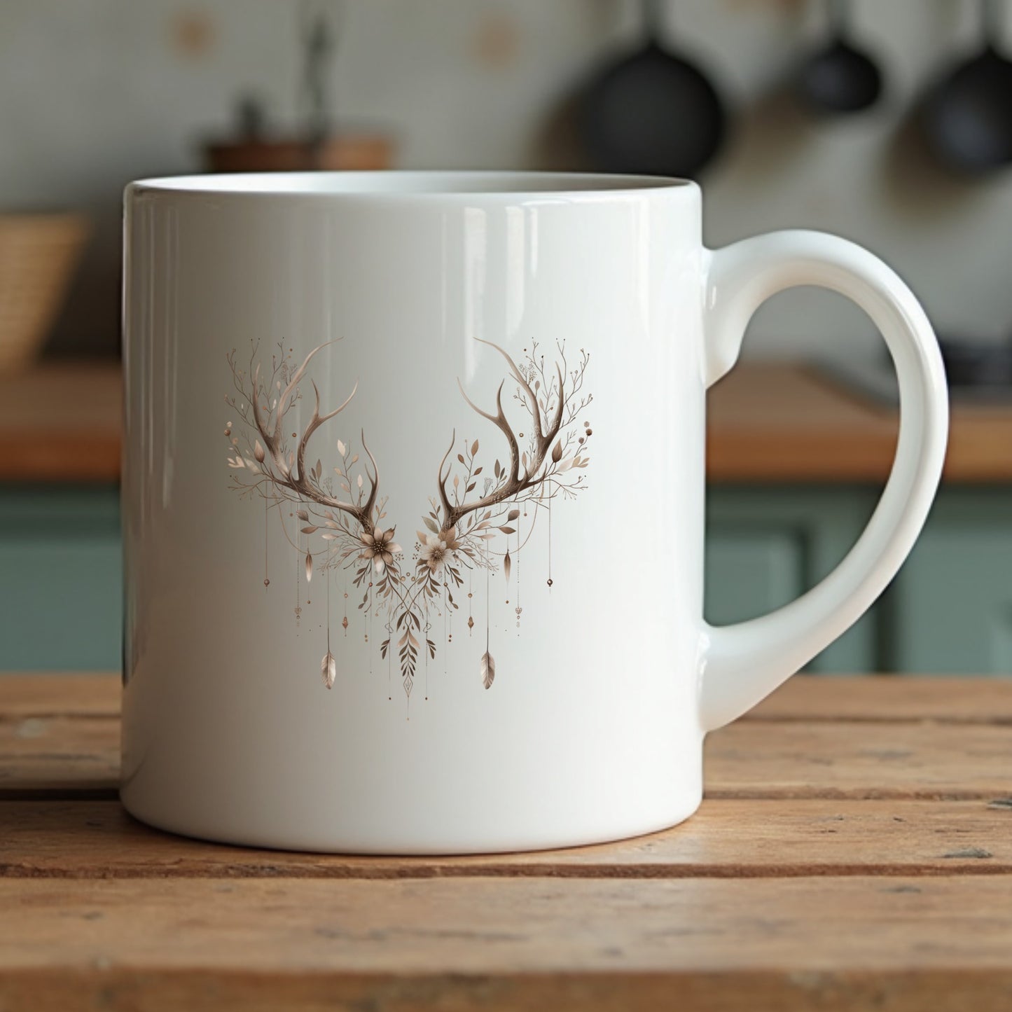 White mug with deer antler design on a wooden surface