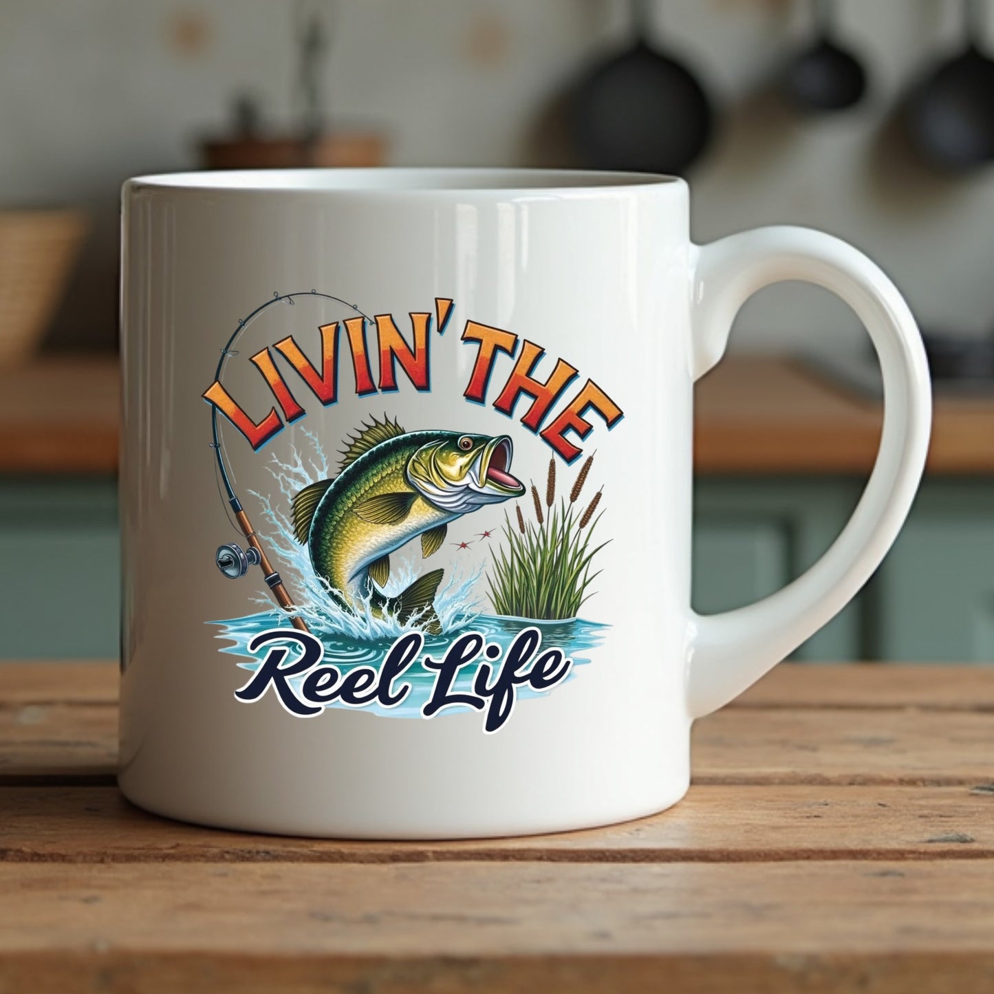 White mug with fishing-themed design featuring a fish and Livin' The Reel Life text on a wooden surface.