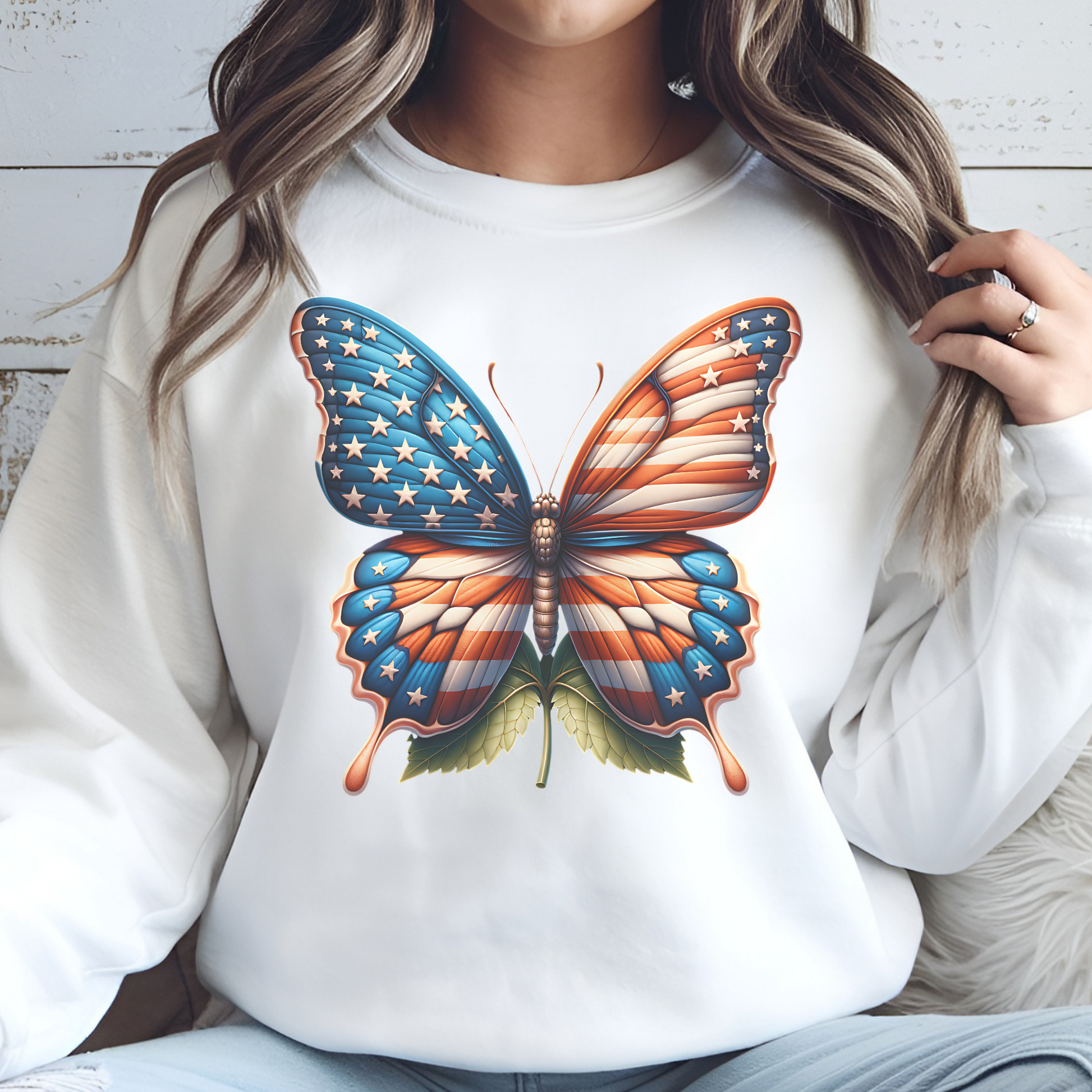 Patriotic Butterfly PNG Digital Design on a woman's white sweatshirt