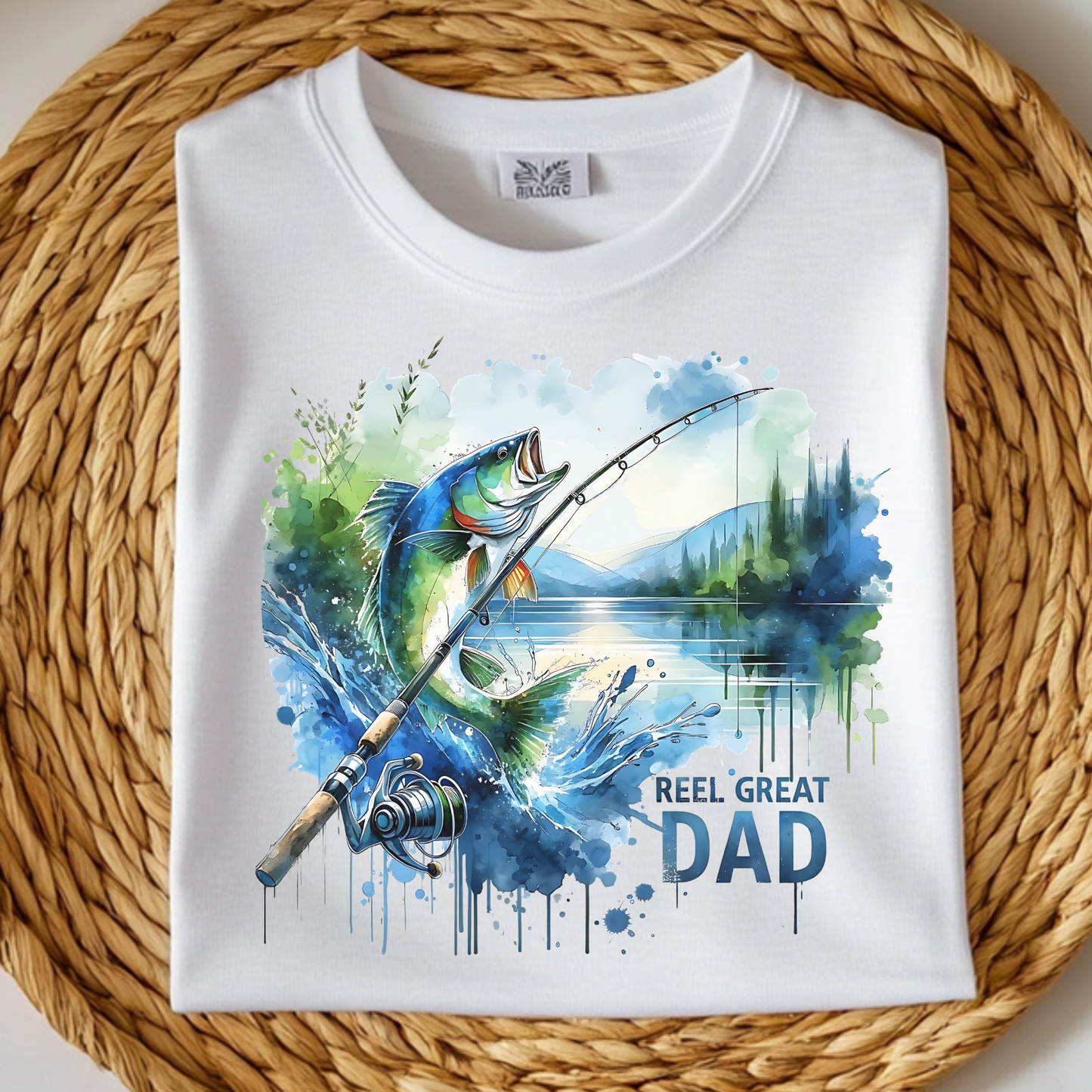 Reel Great Dad Father's Day PNG Digital Design on a folded white t-shirt