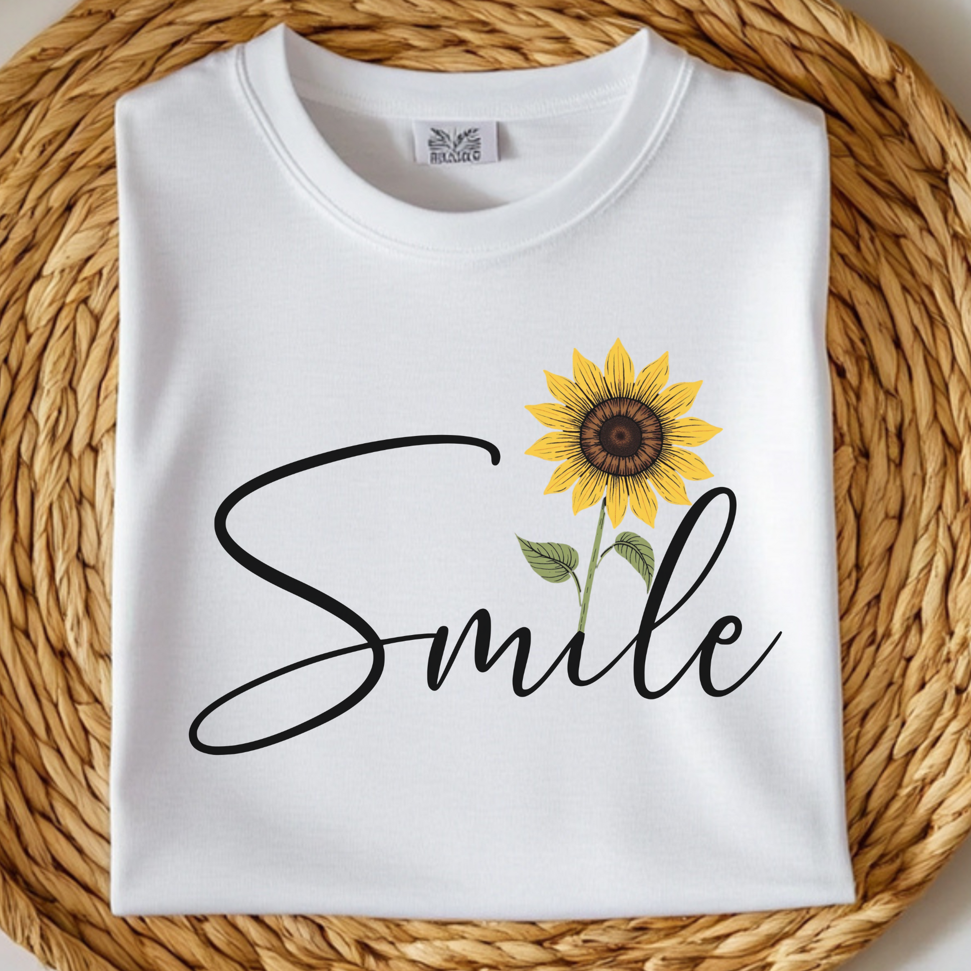 Sunflower Smile PNG digital design on a folded white t-shirt